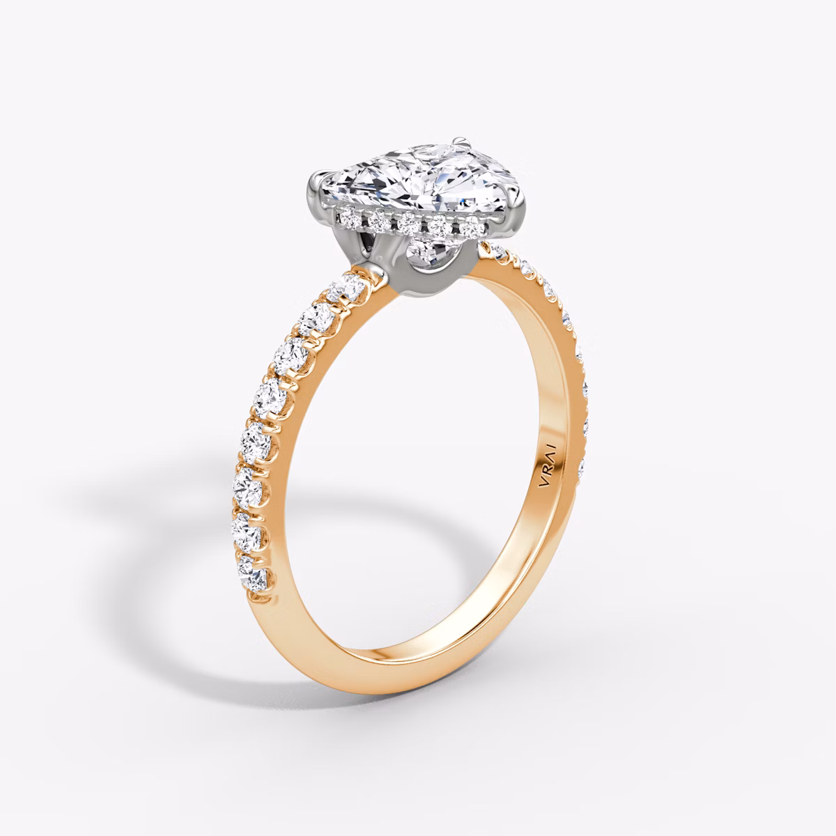 The Signature | Trillion | 14k | Rose Gold and Platinum | bandAccent: Pavé | bandWidth: large | hiddenHalo: yes | diamondOrientation: horizontal | caratWeight: other