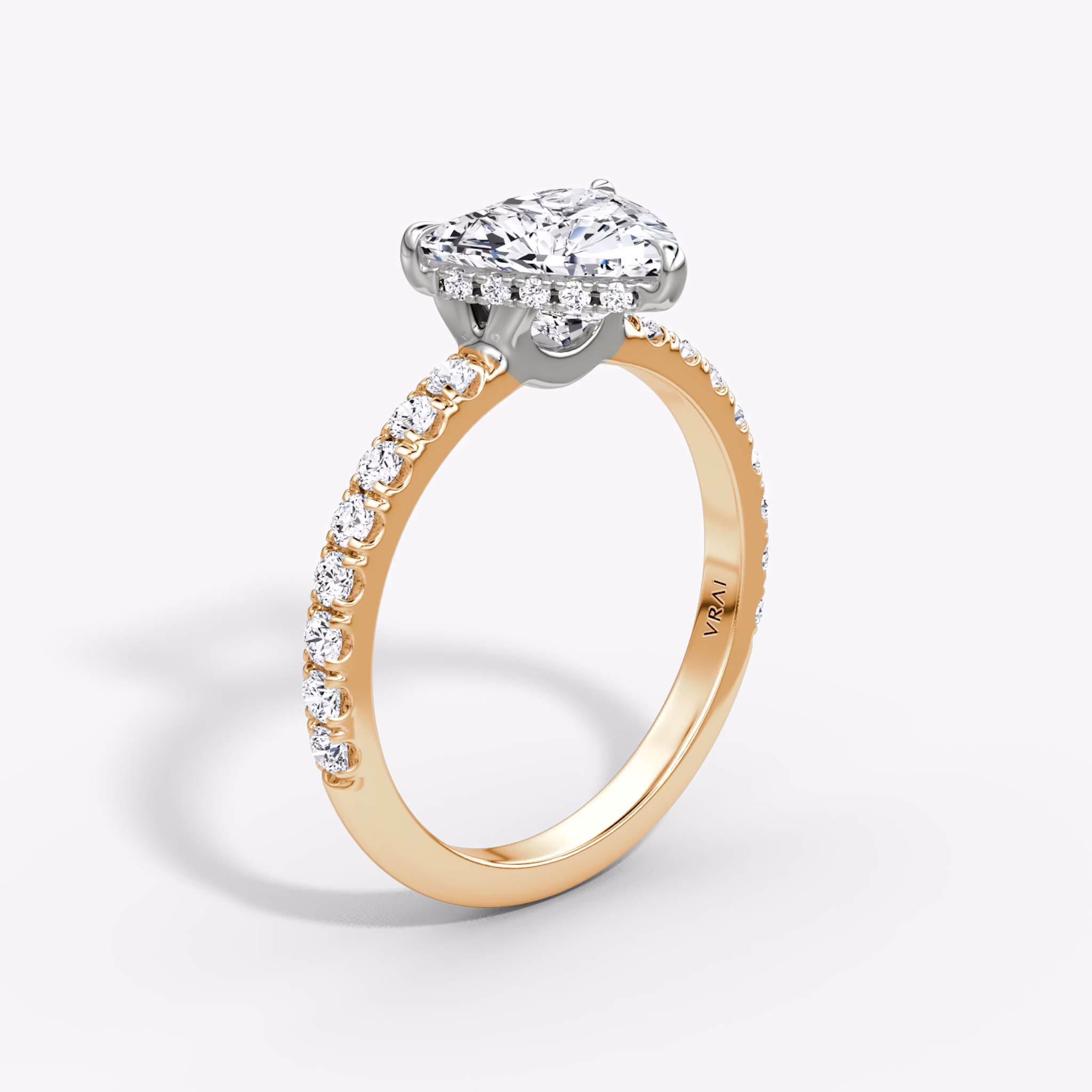 The Signature | Trillion | 14k | Rose Gold and Platinum | bandAccent: Pavé | bandWidth: large | hiddenHalo: yes | diamondOrientation: vertical | caratWeight: other