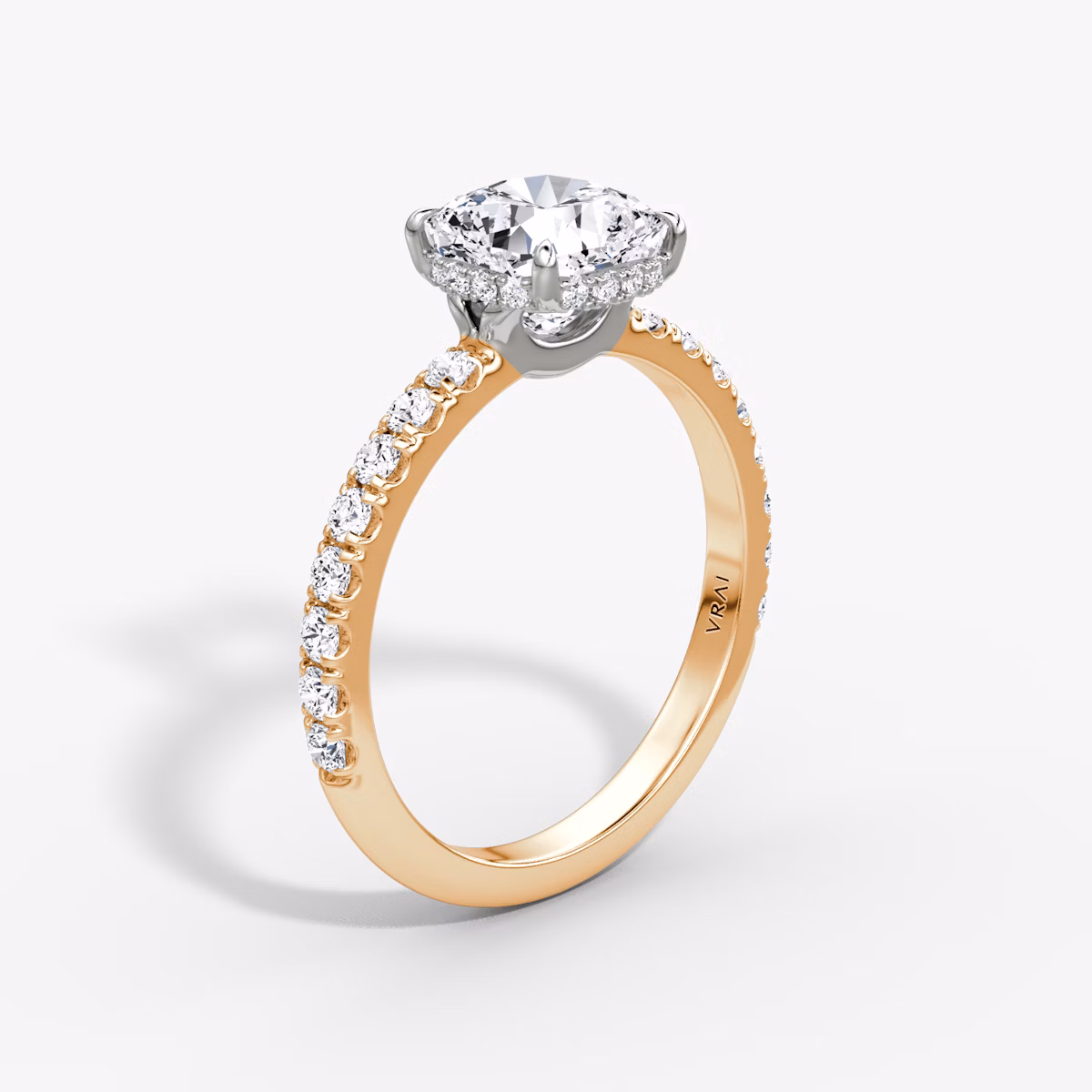 The Signature | Cushion | 14k | Rose Gold and Platinum | bandAccent: Pavé | bandWidth: large | hiddenHalo: yes | diamondOrientation: vertical | caratWeight: other