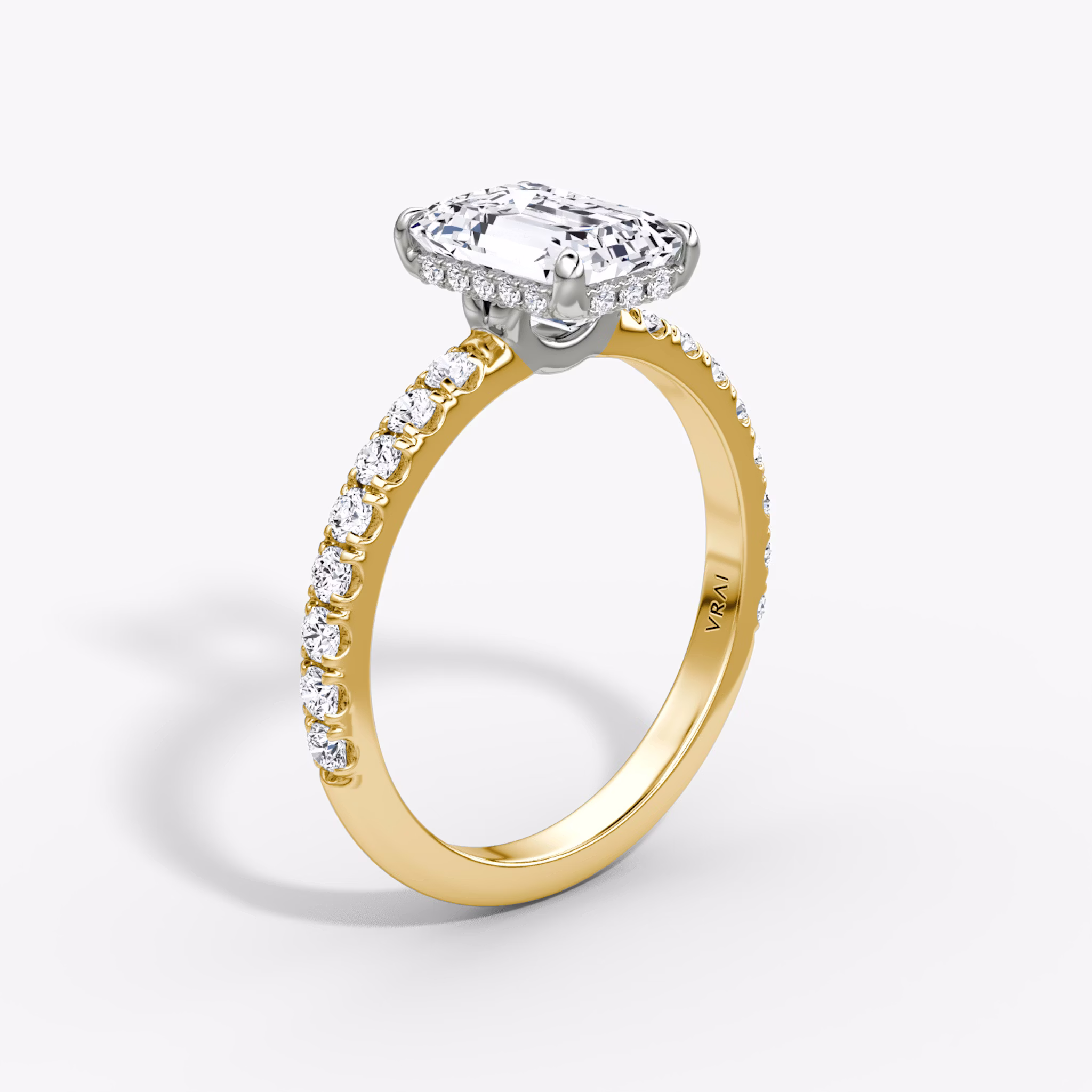 The Signature | Emerald | 18k | Yellow Gold and Platinum | bandAccent: Pavé | bandWidth: large | hiddenHalo: yes | diamondOrientation: vertical | caratWeight: other
