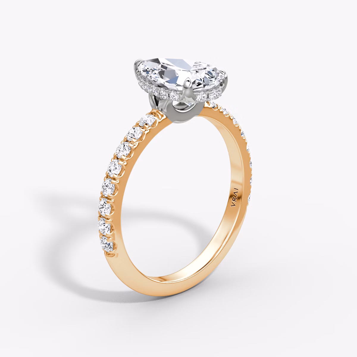 The Signature | Pear | 14k | Rose Gold and Platinum | bandAccent: Pavé | bandWidth: large | hiddenHalo: yes | diamondOrientation: vertical | caratWeight: other