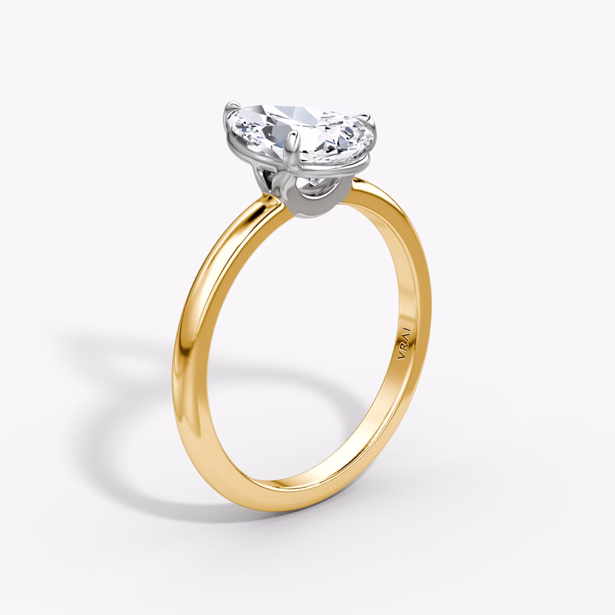 The Signature | Pear | 18k | Yellow Gold and Platinum | bandAccent: Plain | bandWidth: large | hiddenHalo: no | diamondOrientation: vertical | caratWeight: other