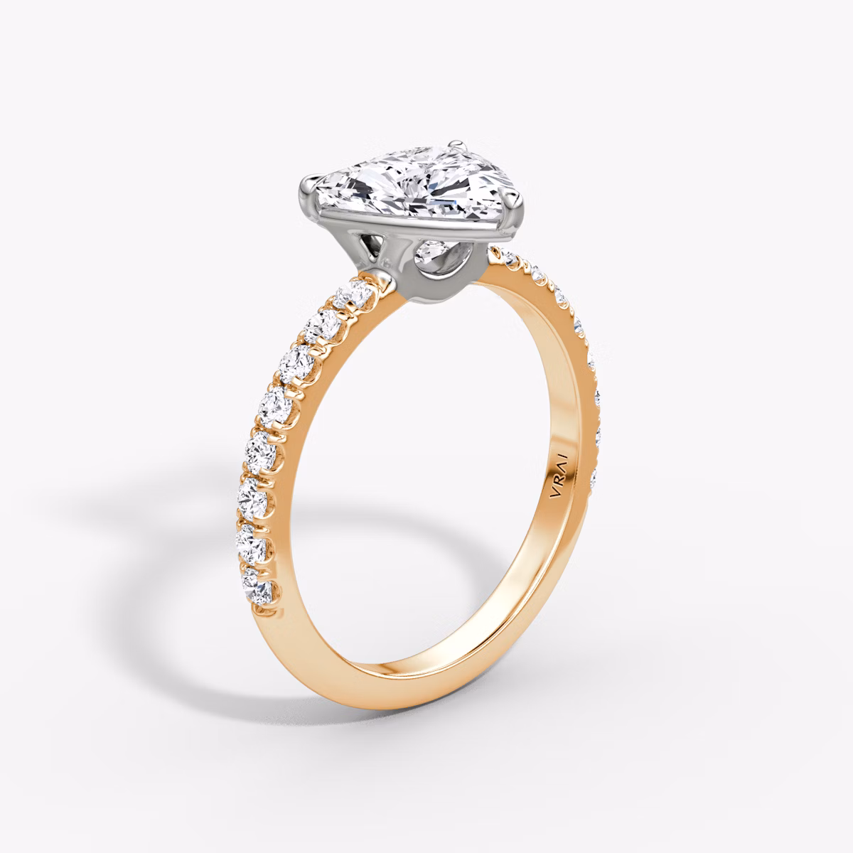 The Signature | Trillion | 14k | Rose Gold and Platinum | bandAccent: Pavé | bandWidth: large | hiddenHalo: no | diamondOrientation: vertical | caratWeight: other