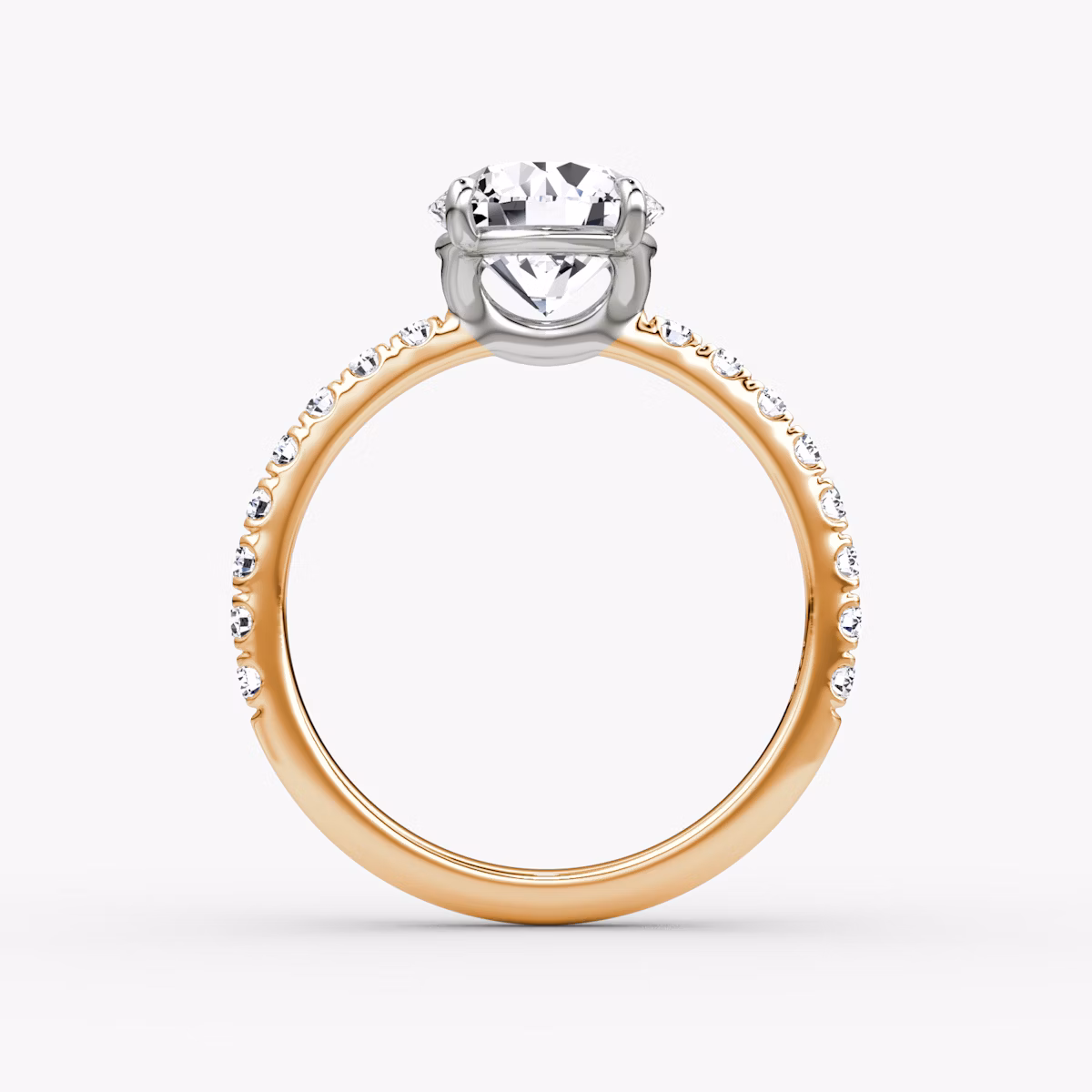 The Signature | Round Brilliant | 14k | Rose Gold and Platinum | bandAccent: Pavé | bandWidth: large | caratWeight: 1.5ct | hiddenHalo: no | diamondOrientation: vertical
