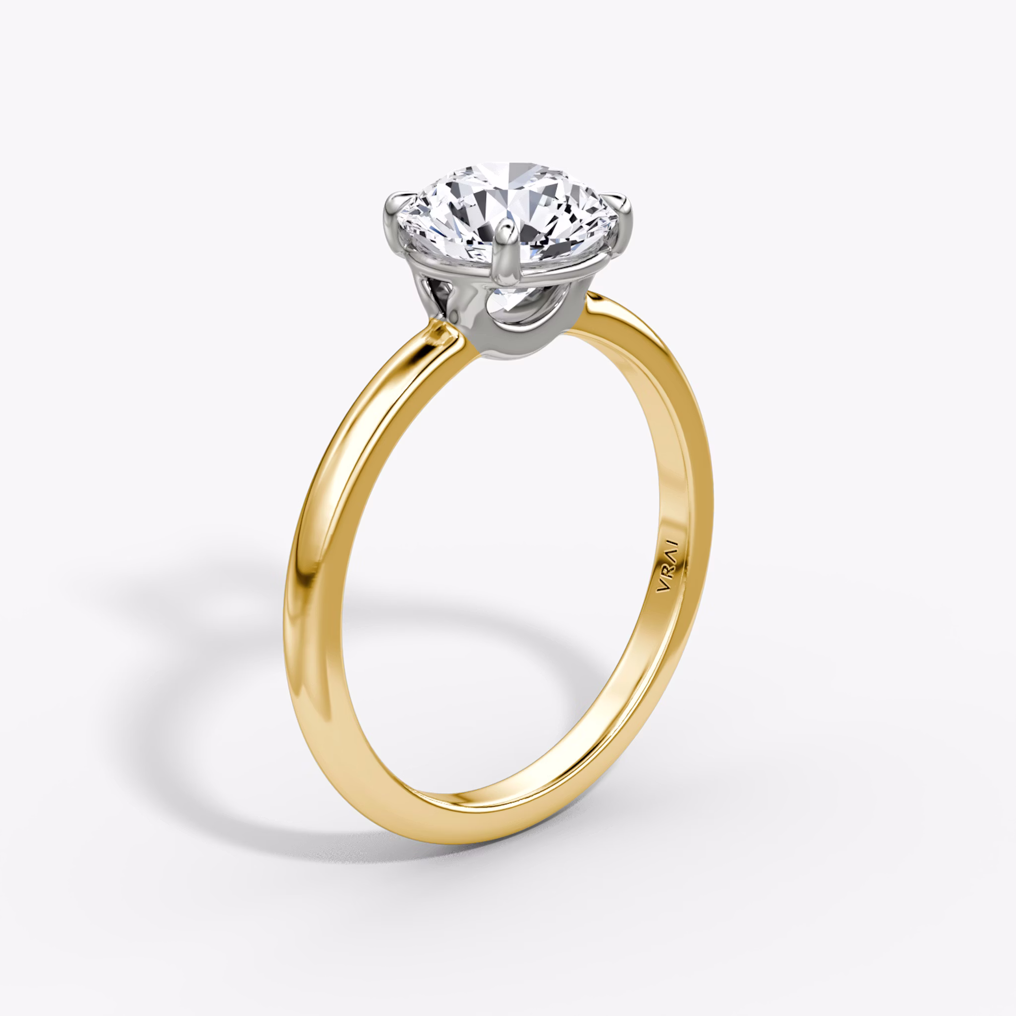 The Signature | Round Brilliant | 18k | Yellow Gold and Platinum | bandAccent: Plain | bandWidth: large | caratWeight: 2.0ct | hiddenHalo: no | diamondOrientation: vertical