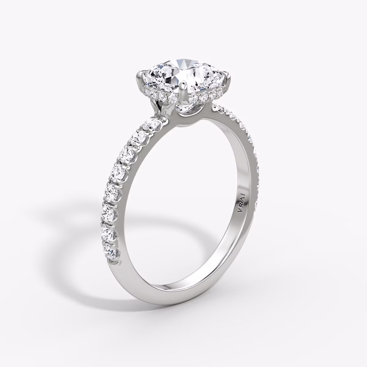 The Signature | Cushion | 18k | White Gold | bandAccent: Pavé | bandWidth: large | hiddenHalo: yes | diamondOrientation: vertical | caratWeight: other