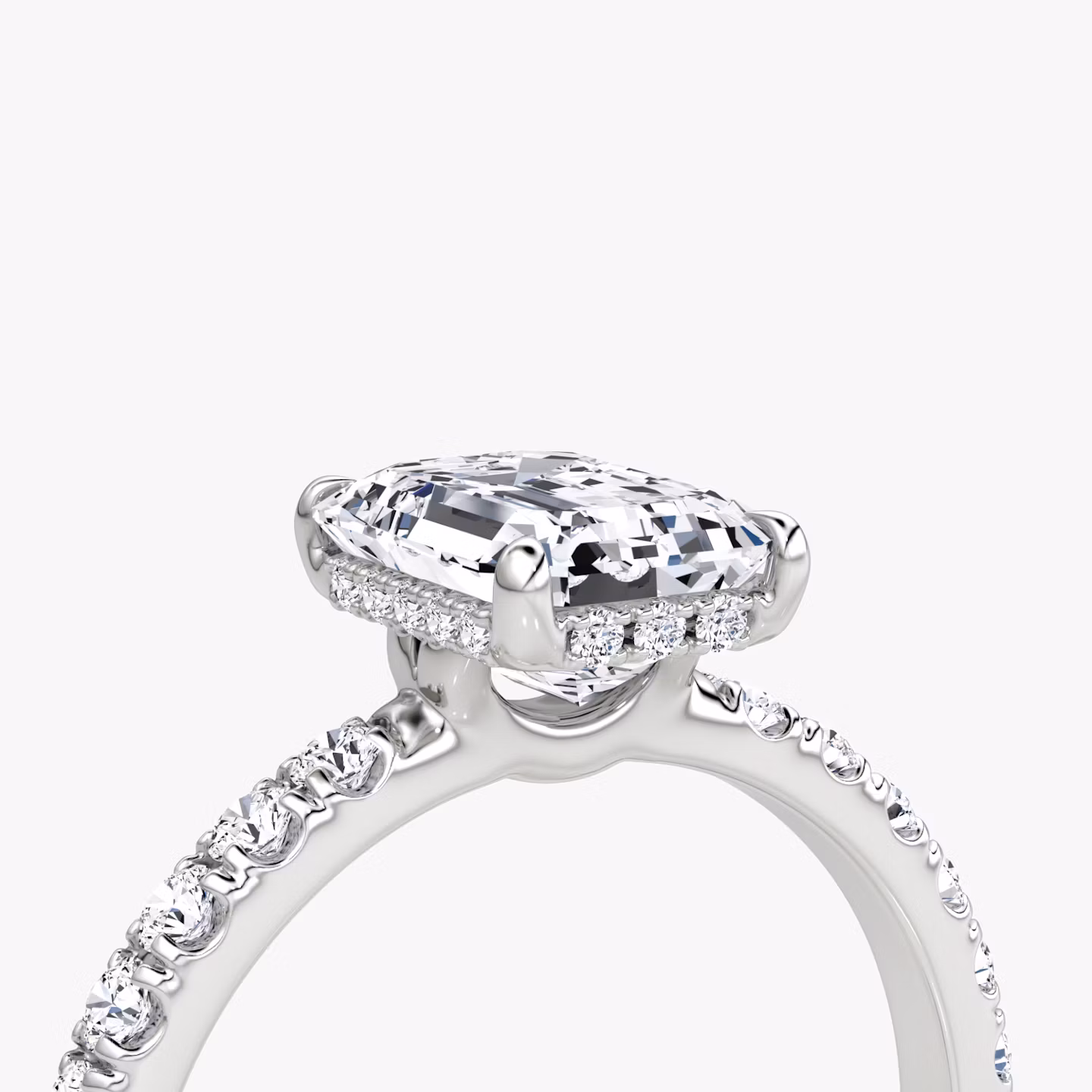 The Signature | Emerald | Platinum | bandAccent: Pavé | bandWidth: large | hiddenHalo: yes | diamondOrientation: vertical | caratWeight: other