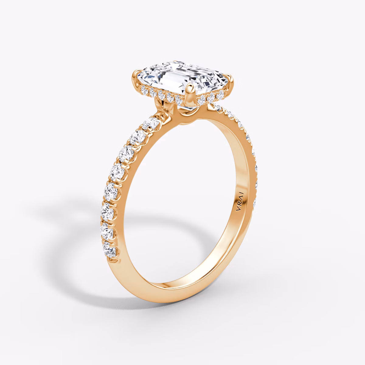 The Signature | Emerald | 14k | Rose Gold | bandAccent: Pavé | bandWidth: large | hiddenHalo: yes | diamondOrientation: vertical | caratWeight: other