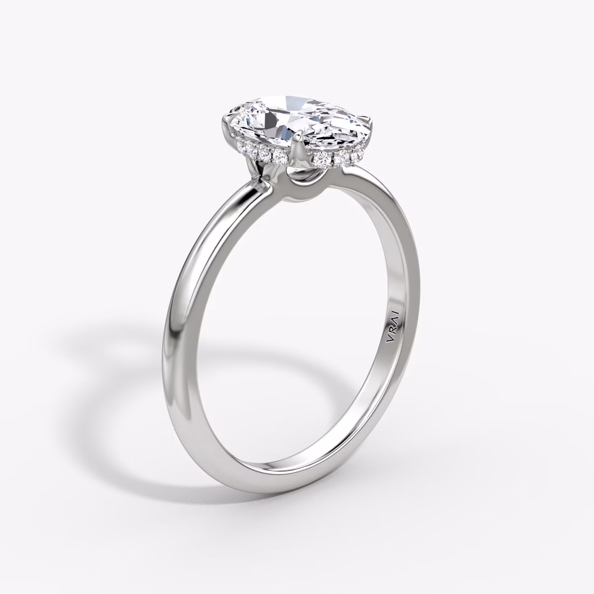 The Signature | Oval | Platinum | bandAccent: Plain | bandWidth: large | hiddenHalo: yes | diamondOrientation: vertical | caratWeight: other