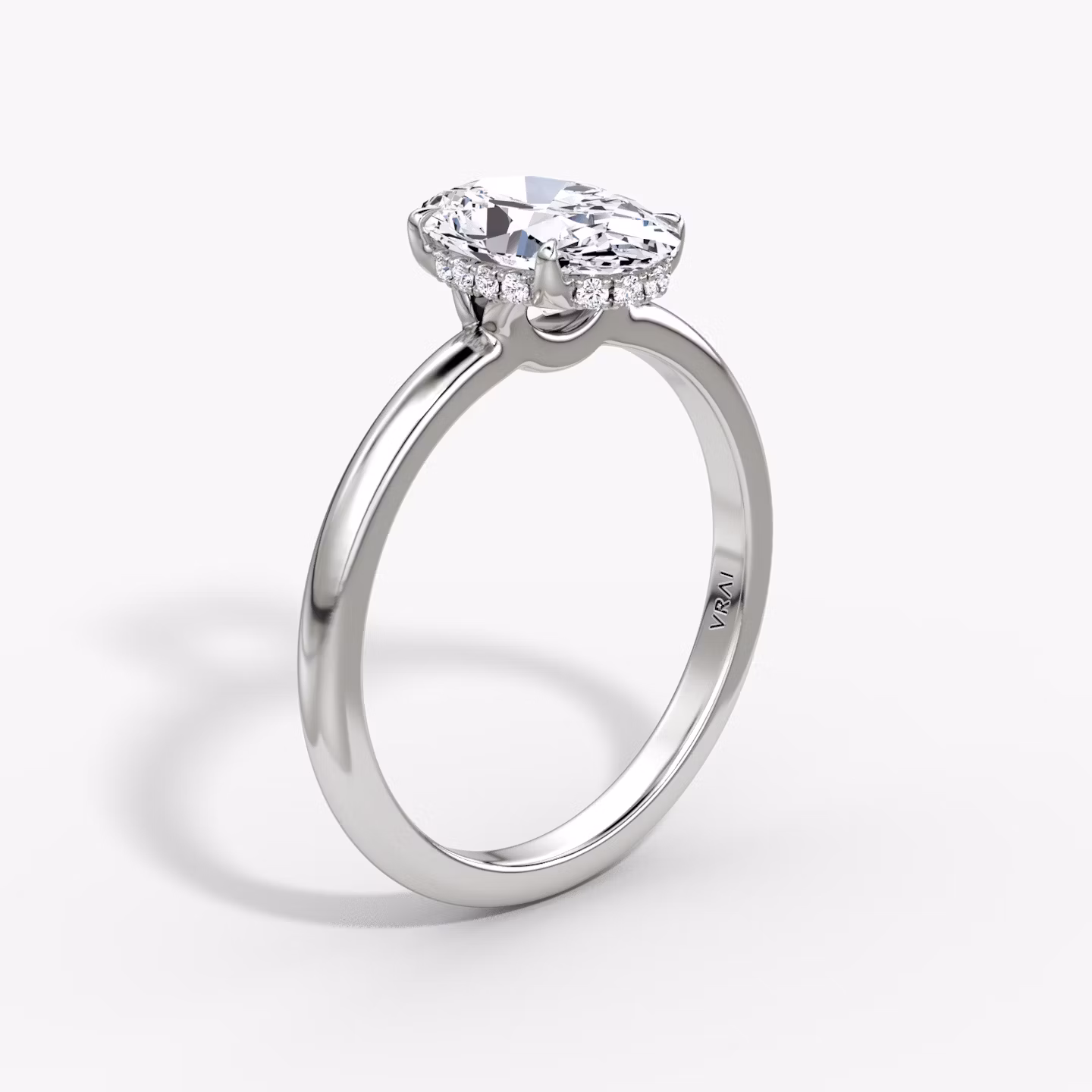 The Signature | Oval | 18k | White Gold | bandAccent: Plain | bandWidth: large | hiddenHalo: yes | diamondOrientation: vertical | caratWeight: other