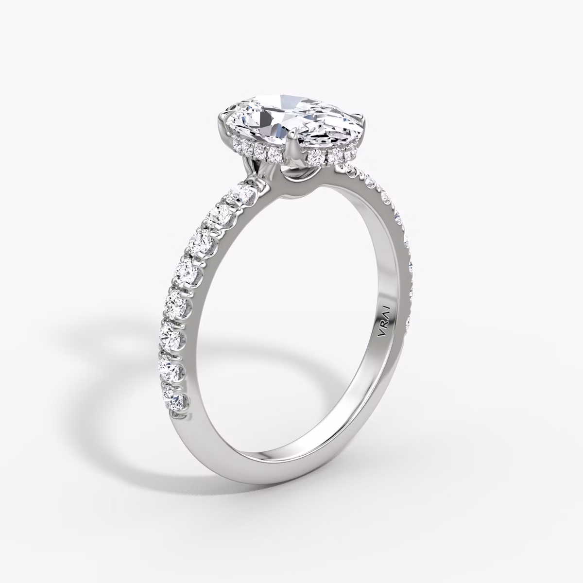 The Signature | Oval | Platinum | bandAccent: Pavé | bandWidth: large | hiddenHalo: yes | diamondOrientation: vertical | caratWeight: other