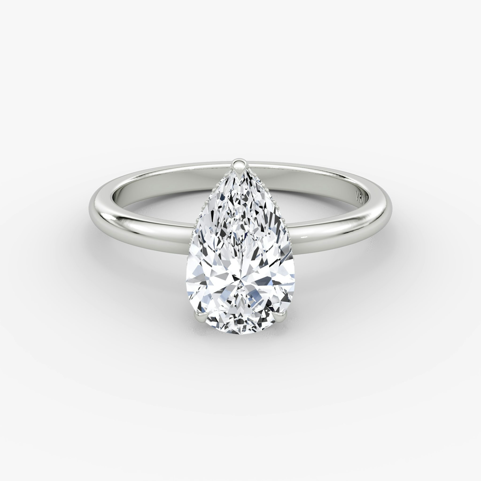 The Signature | Pear | 18k | White Gold | bandAccent: Plain | bandWidth: large | hiddenHalo: yes | diamondOrientation: vertical | caratWeight: other