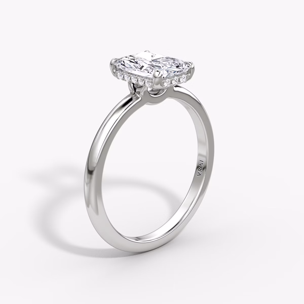 The Signature | Radiant | Platinum | bandAccent: Plain | bandWidth: large | hiddenHalo: yes | diamondOrientation: vertical | caratWeight: other