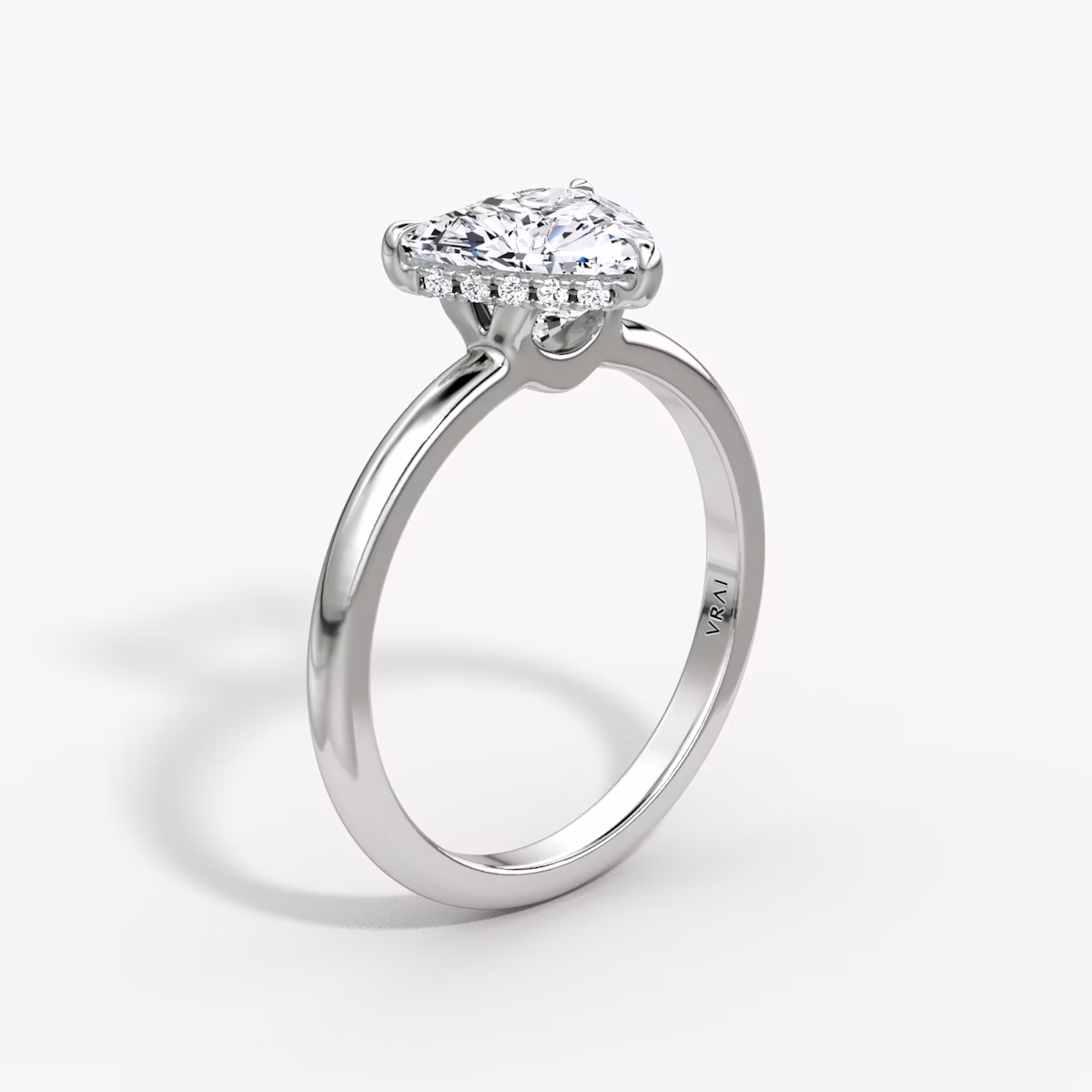 The Signature | Trillion | 18k | White Gold | bandAccent: Plain | bandWidth: large | hiddenHalo: yes | diamondOrientation: vertical | caratWeight: other
