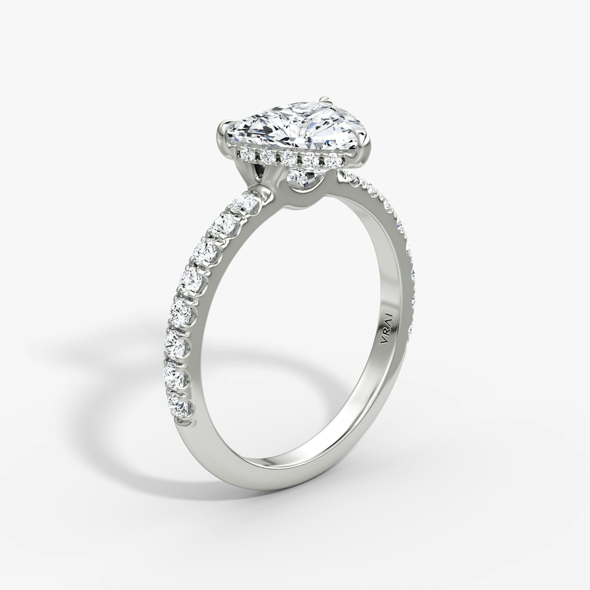 The Signature | Trillion | 18k | White Gold | bandAccent: Pavé | bandWidth: large | hiddenHalo: yes | diamondOrientation: vertical | caratWeight: other