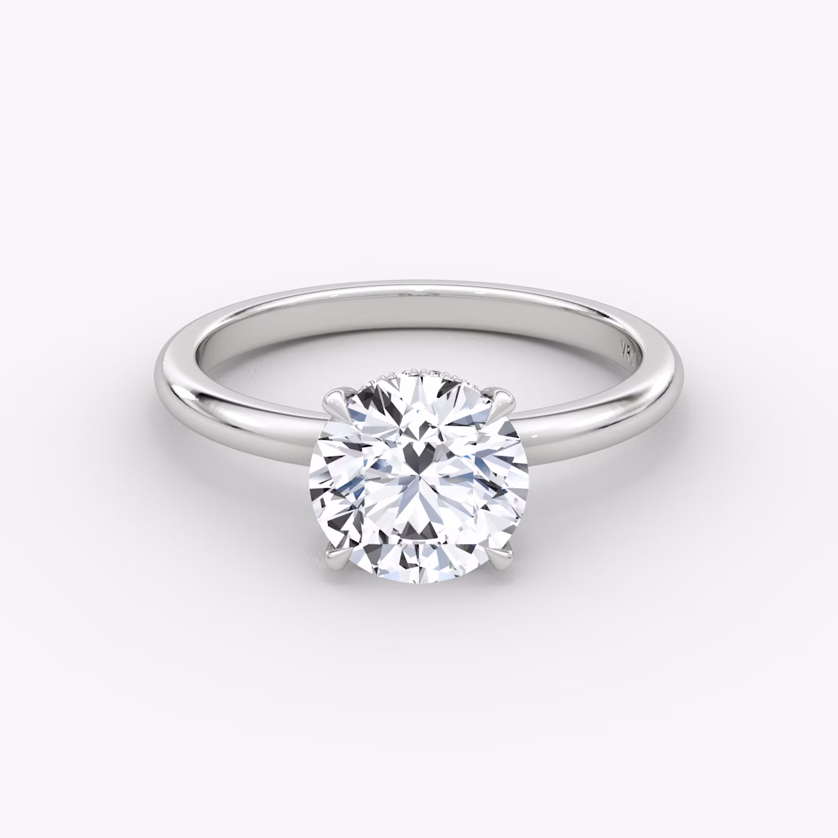 The Signature | Round Brilliant | Platinum | bandAccent: Plain | bandWidth: large | caratWeight: 1.5ct | hiddenHalo: yes | diamondOrientation: vertical