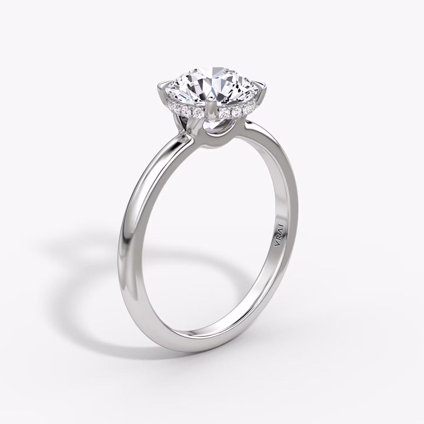The Signature | Round Brilliant | 18k | White Gold | bandAccent: Plain | bandWidth: large | caratWeight: 1.5ct | hiddenHalo: yes | diamondOrientation: vertical