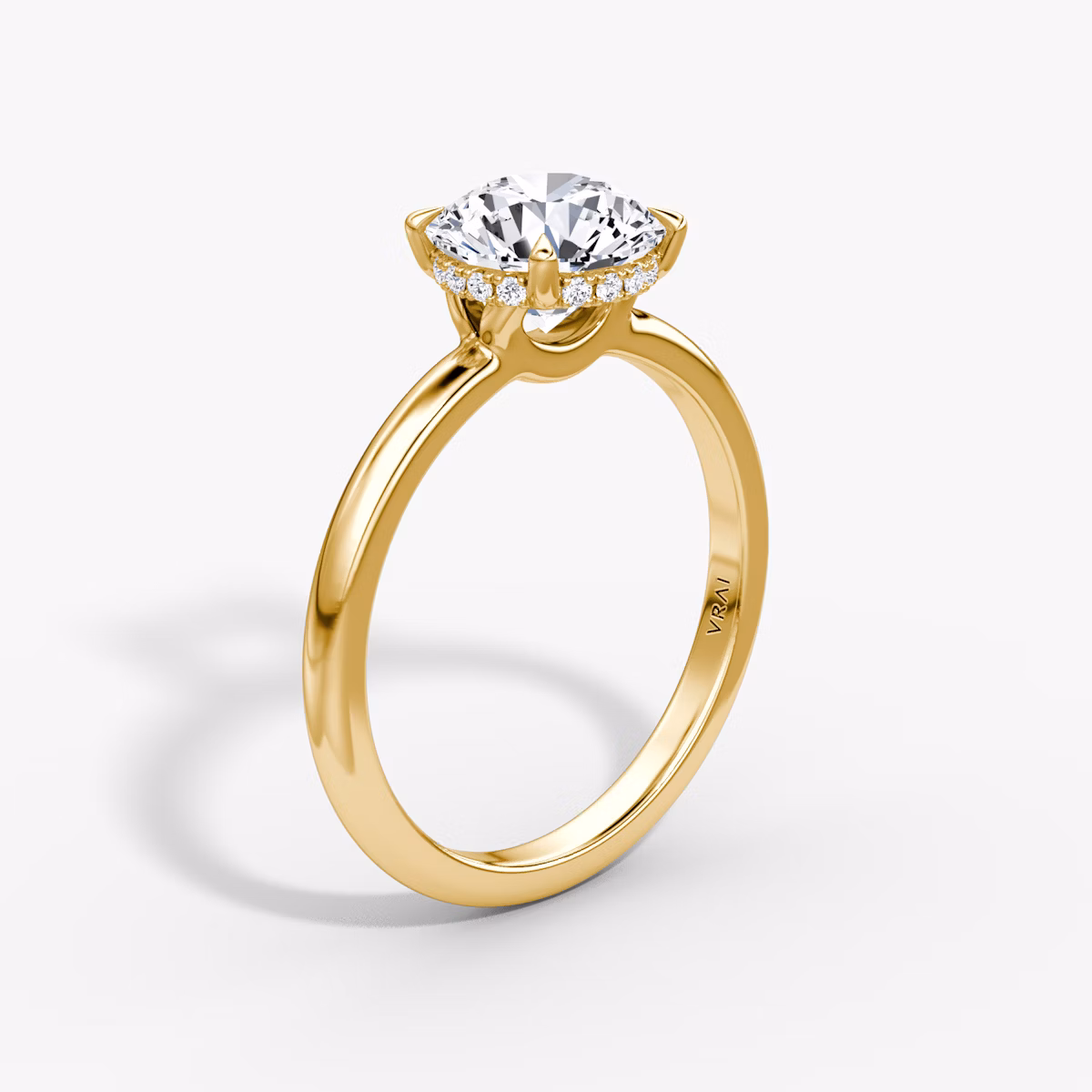 The Signature | Round Brilliant | 18k | Yellow Gold | bandAccent: Plain | bandWidth: large | caratWeight: other | hiddenHalo: yes | diamondOrientation: vertical