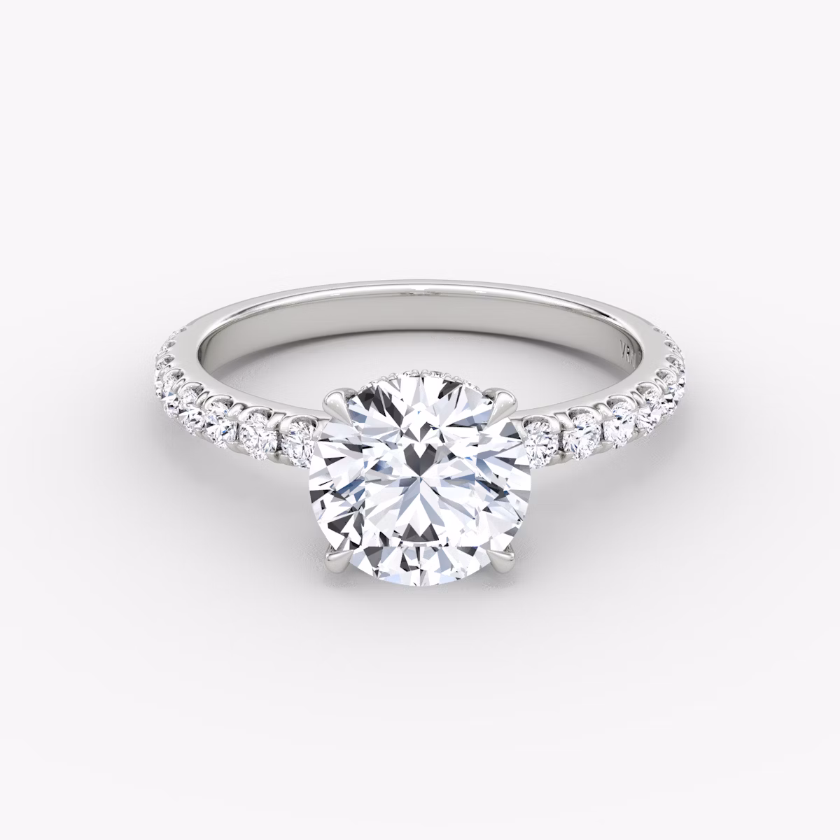 The Signature | Round Brilliant | Platinum | bandAccent: Pavé | bandWidth: large | caratWeight: 1.5ct | hiddenHalo: yes | diamondOrientation: vertical