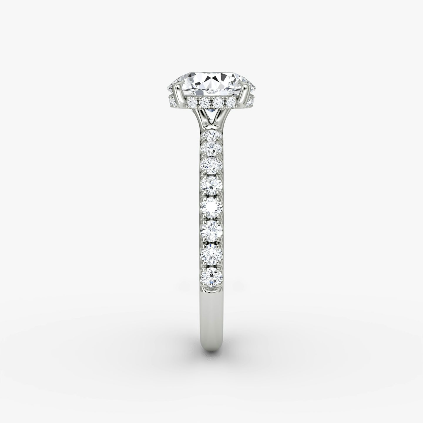 The Signature | Round Brilliant | Platinum | bandAccent: Pavé | bandWidth: large | caratWeight: other | hiddenHalo: yes | diamondOrientation: vertical