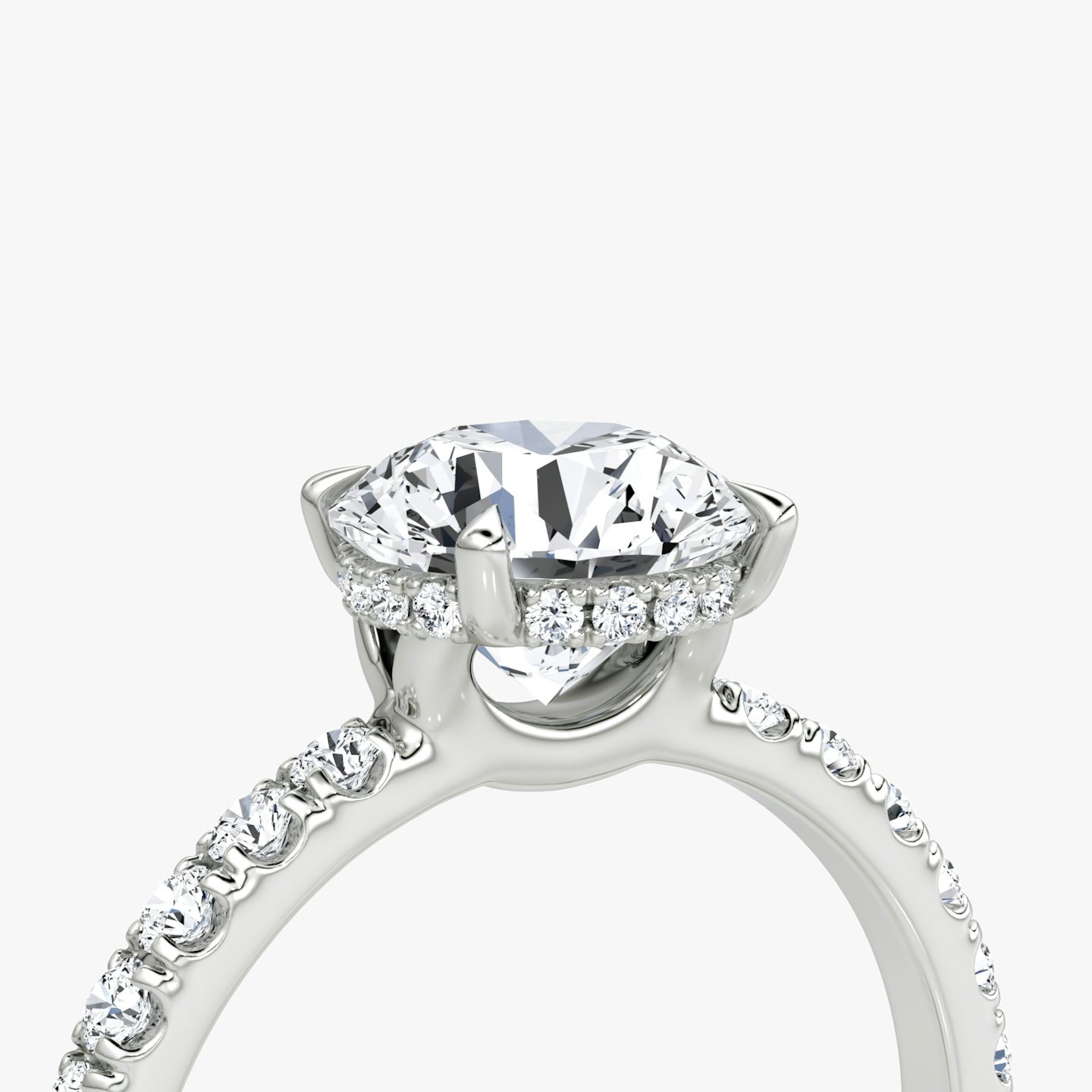 The Signature | Round Brilliant | Platinum | bandAccent: Pavé | bandWidth: large | caratWeight: other | hiddenHalo: yes | diamondOrientation: vertical