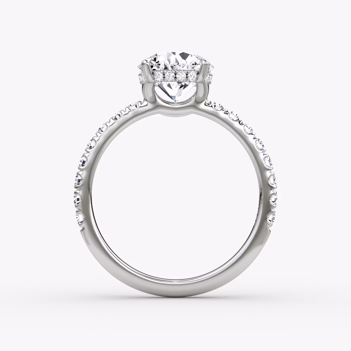 The Signature | Round Brilliant | Platinum | bandAccent: Pavé | bandWidth: large | caratWeight: 1.5ct | hiddenHalo: yes | diamondOrientation: vertical