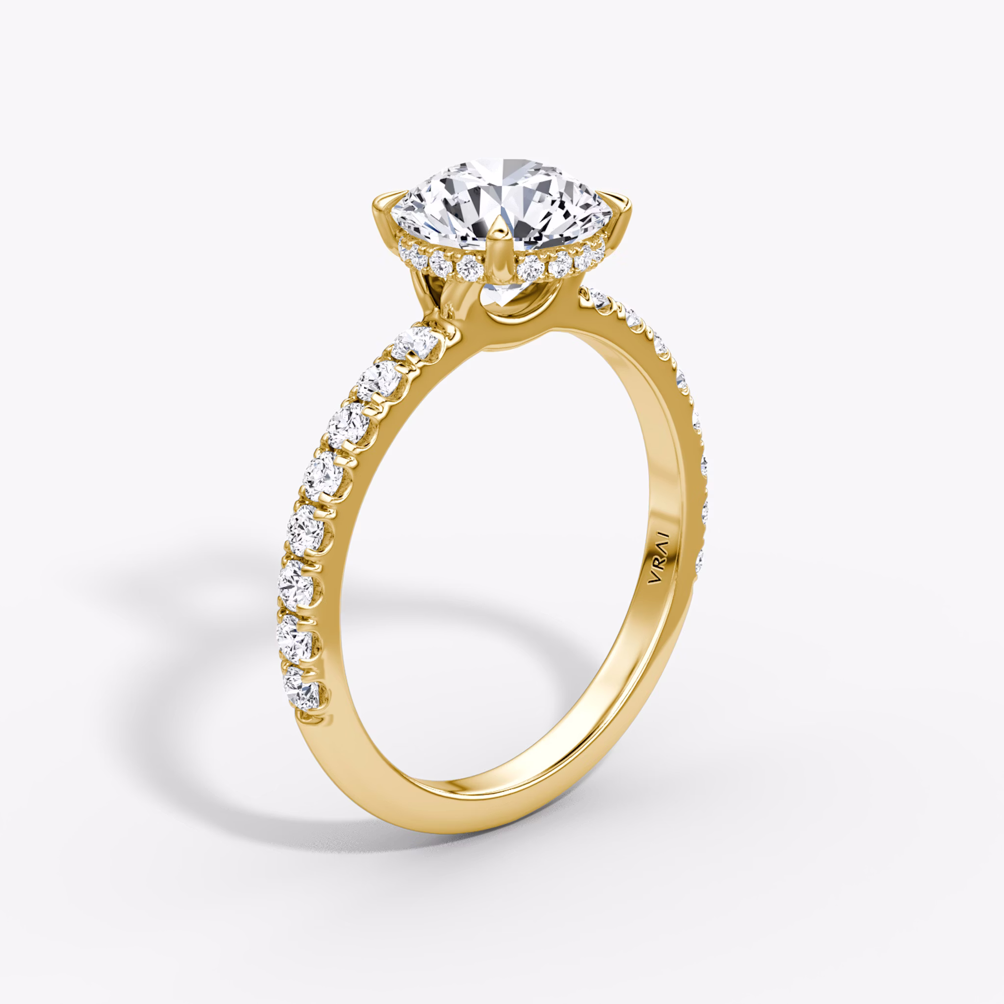 The Signature | Round Brilliant | 18k | Yellow Gold | bandAccent: Pavé | bandWidth: large | caratWeight: other | hiddenHalo: yes | diamondOrientation: vertical