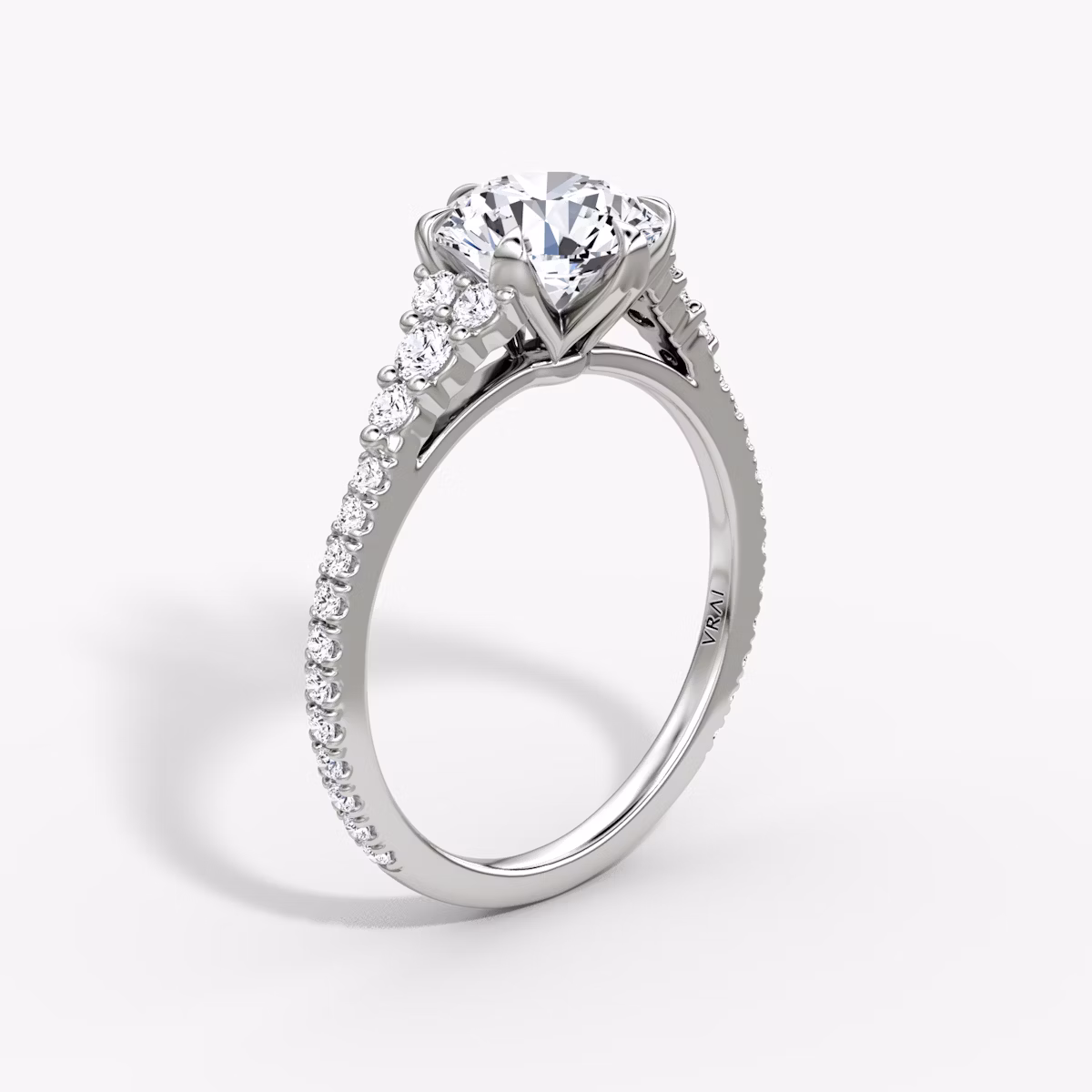 The Round Cluster Heirloom | Round Brilliant | Platinum | bandAccent: Pavé | caratWeight: other | diamondOrientation: vertical