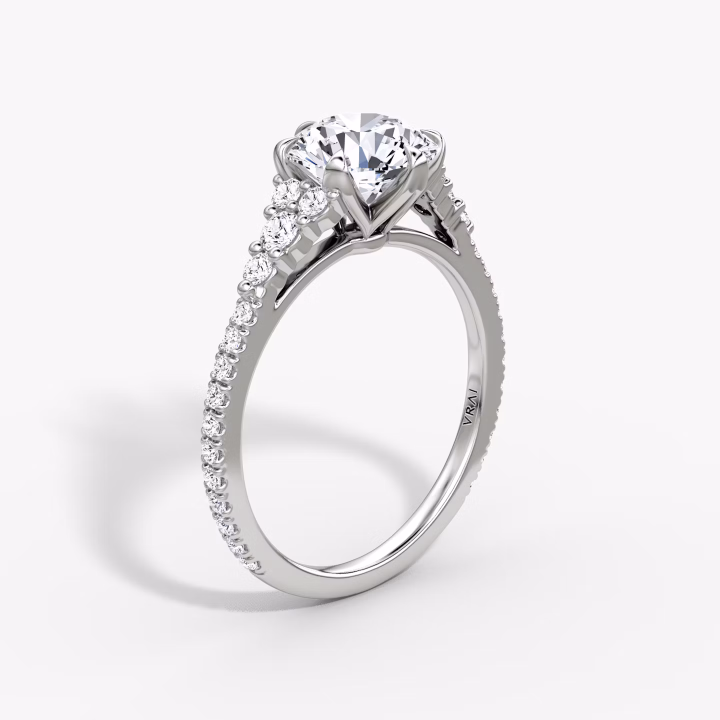 The Round Cluster Heirloom | Round Brilliant | Platinum | bandAccent: Pavé | caratWeight: other | diamondOrientation: vertical