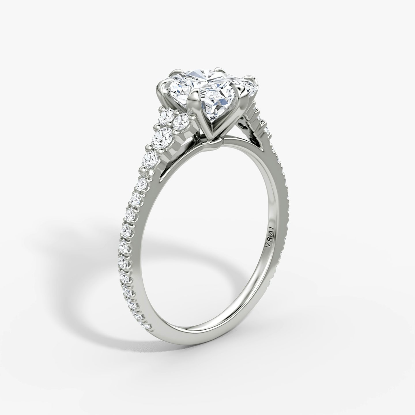 The Round Cluster Heirloom | Radiant | Platinum | bandAccent: Pavé | diamondOrientation: vertical | caratWeight: other
