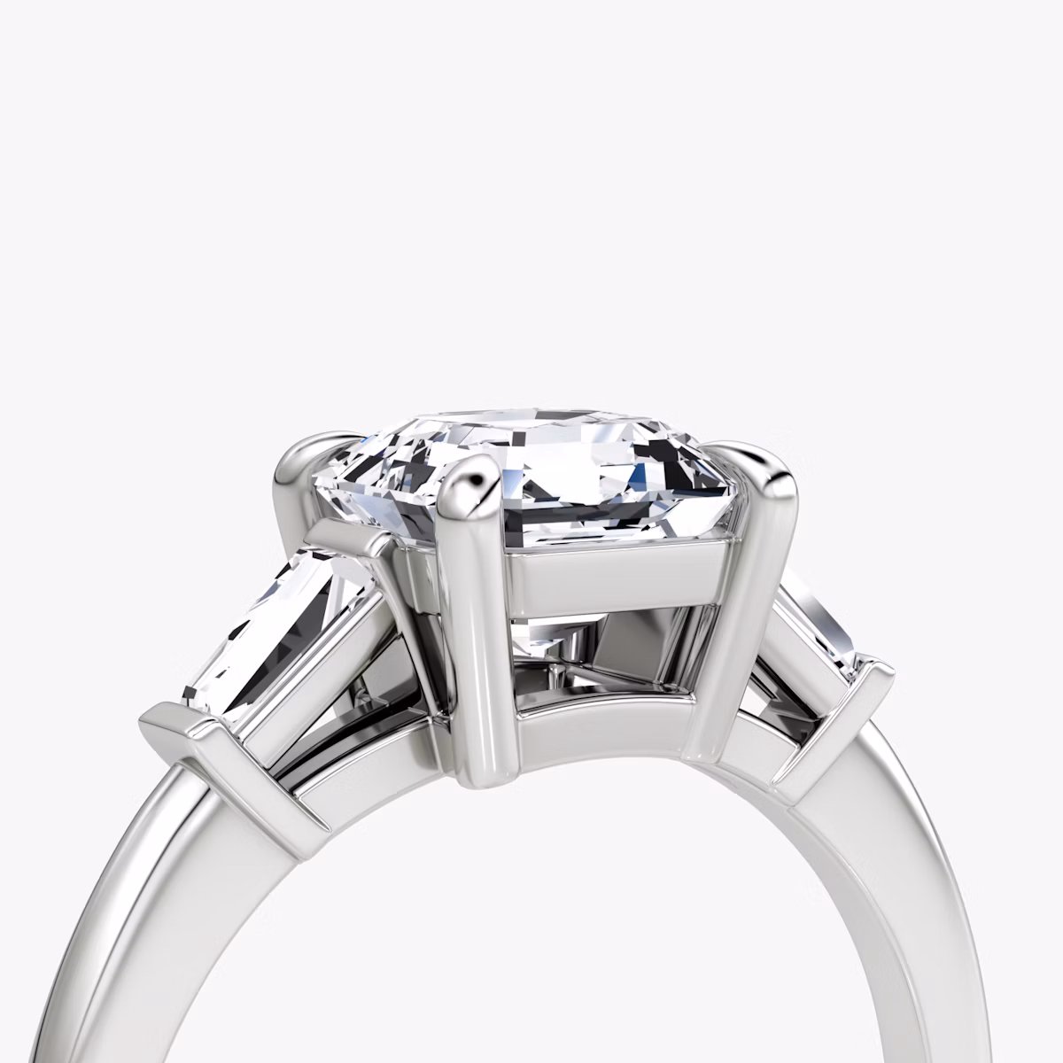 The Tapered Baguette Three Stone | Asscher | Platinum | bandAccent: Plain | caratWeight: 1.0ct | excludeFromFeed: null | diamondOrientation: vertical