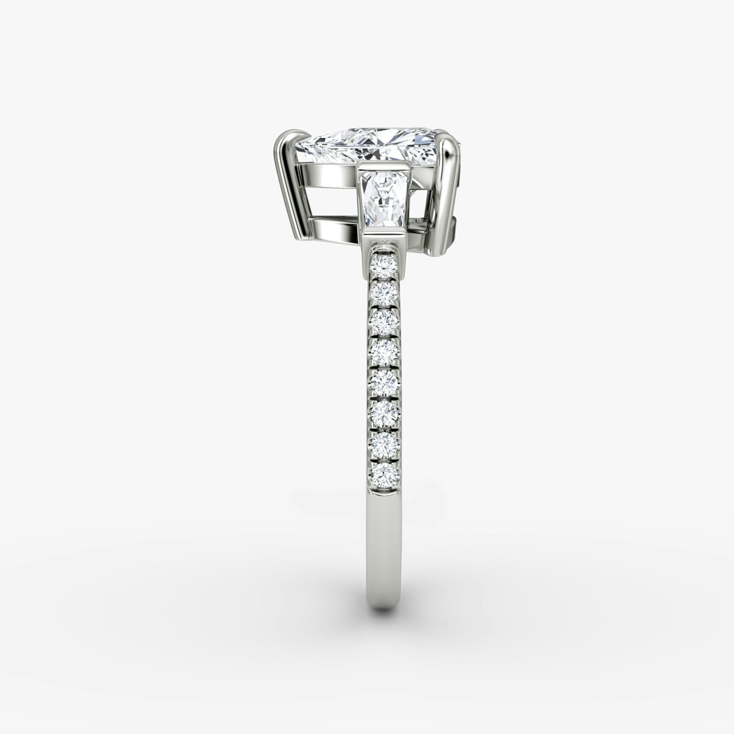 The Tapered Baguette Three Stone | Trillion | Platinum | bandAccent: Pavé | excludeFromFeed: null | diamondOrientation: vertical | caratWeight: other
