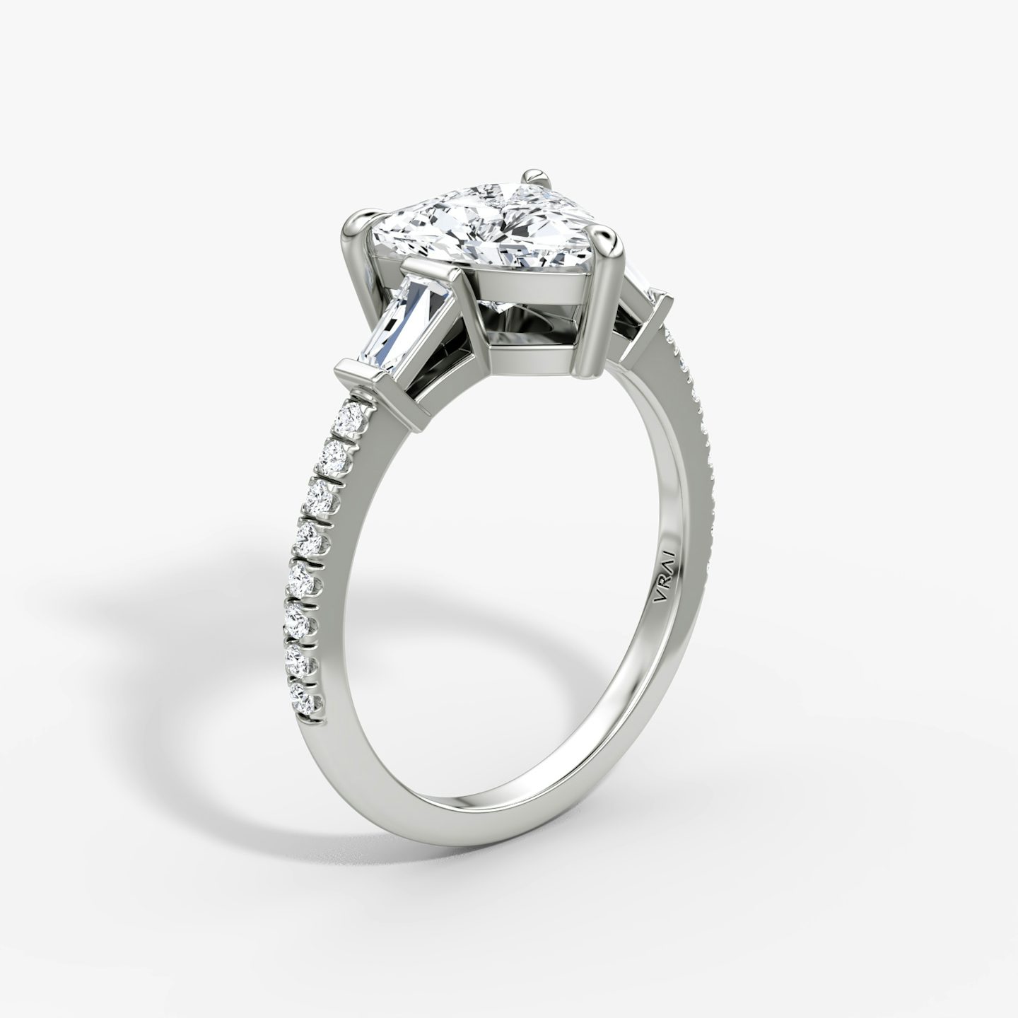 The Tapered Baguette Three Stone | Trillion | Platinum | bandAccent: Pavé | excludeFromFeed: null | diamondOrientation: vertical | caratWeight: other