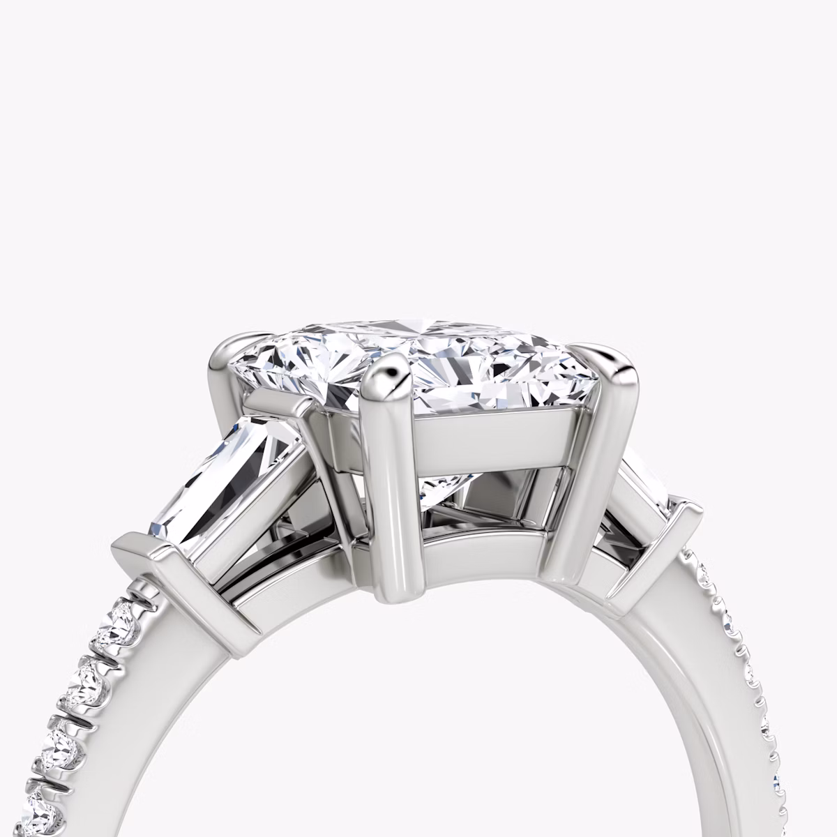 The Tapered Baguette Three Stone | Radiant | 18k | White Gold | bandAccent: Pavé | caratWeight: 1.0ct | excludeFromFeed: null | diamondOrientation: vertical