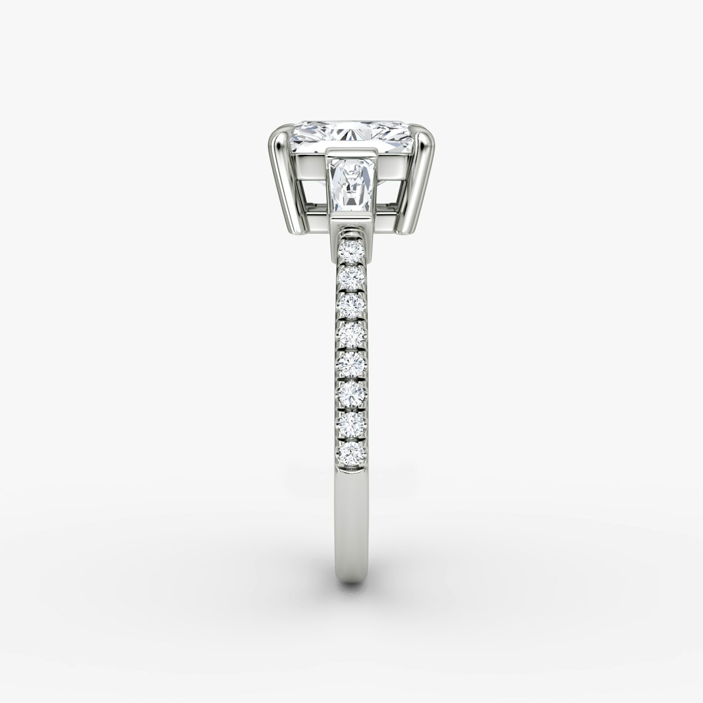 The Tapered Baguette Three Stone | Radiant | Platinum | bandAccent: Pavé | excludeFromFeed: null | diamondOrientation: vertical | caratWeight: other