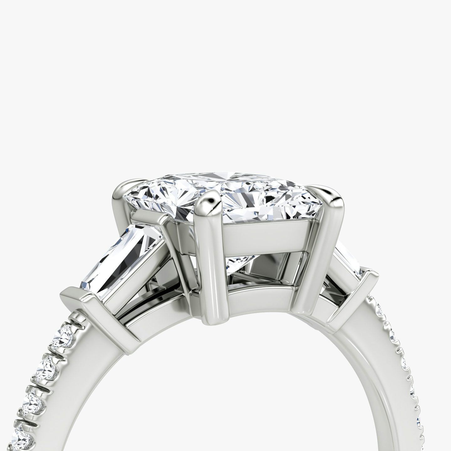 The Tapered Baguette Three Stone | Radiant | Platinum | bandAccent: Pavé | excludeFromFeed: null | diamondOrientation: vertical | caratWeight: other