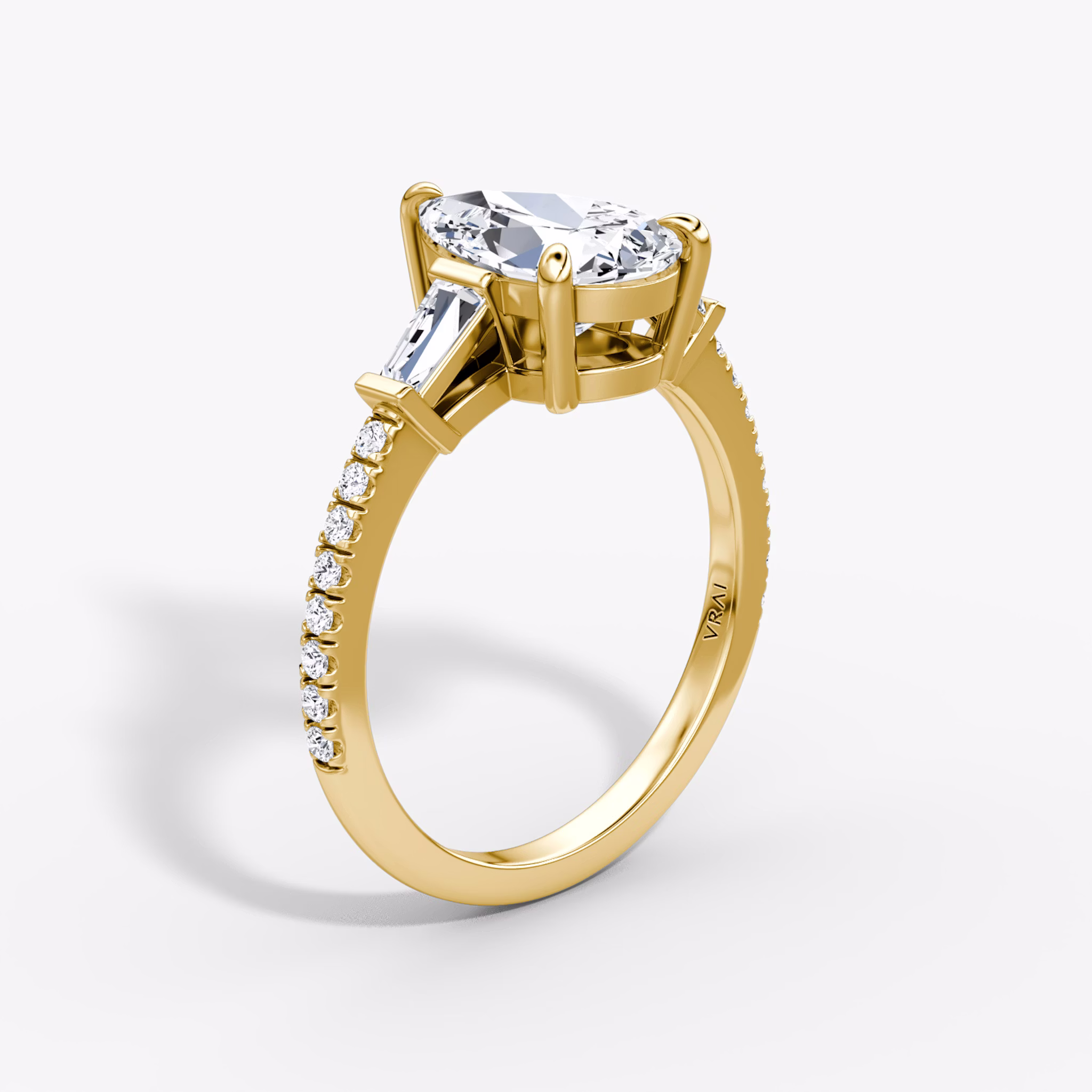 The Tapered Baguette Three Stone | Pear | 18k | Yellow Gold | bandAccent: Pavé | excludeFromFeed: null | diamondOrientation: vertical | caratWeight: other