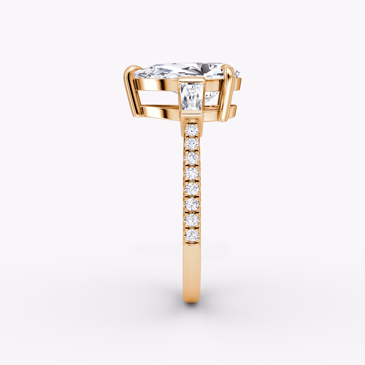 The Tapered Baguette Three Stone | Pear | 14k | Rose Gold | bandAccent: Pavé | caratWeight: 1.0ct | excludeFromFeed: null | diamondOrientation: vertical