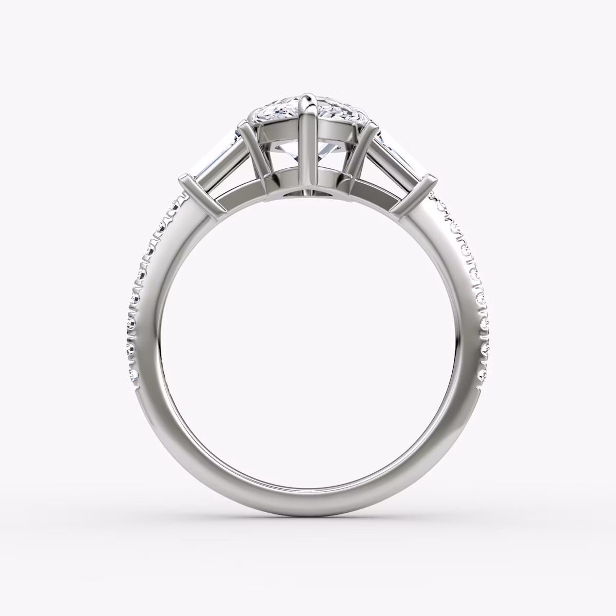 The Tapered Baguette Three Stone | Pear | Platinum | bandAccent: Pavé | caratWeight: 1.0ct | excludeFromFeed: null | diamondOrientation: vertical