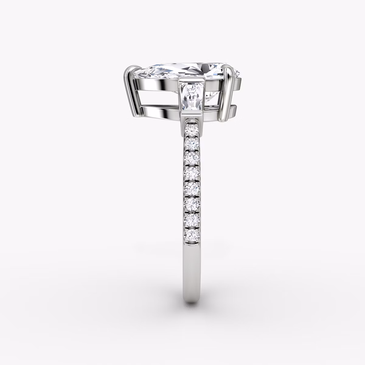 The Tapered Baguette Three Stone | Pear | Platinum | bandAccent: Pavé | caratWeight: 1.0ct | excludeFromFeed: null | diamondOrientation: vertical