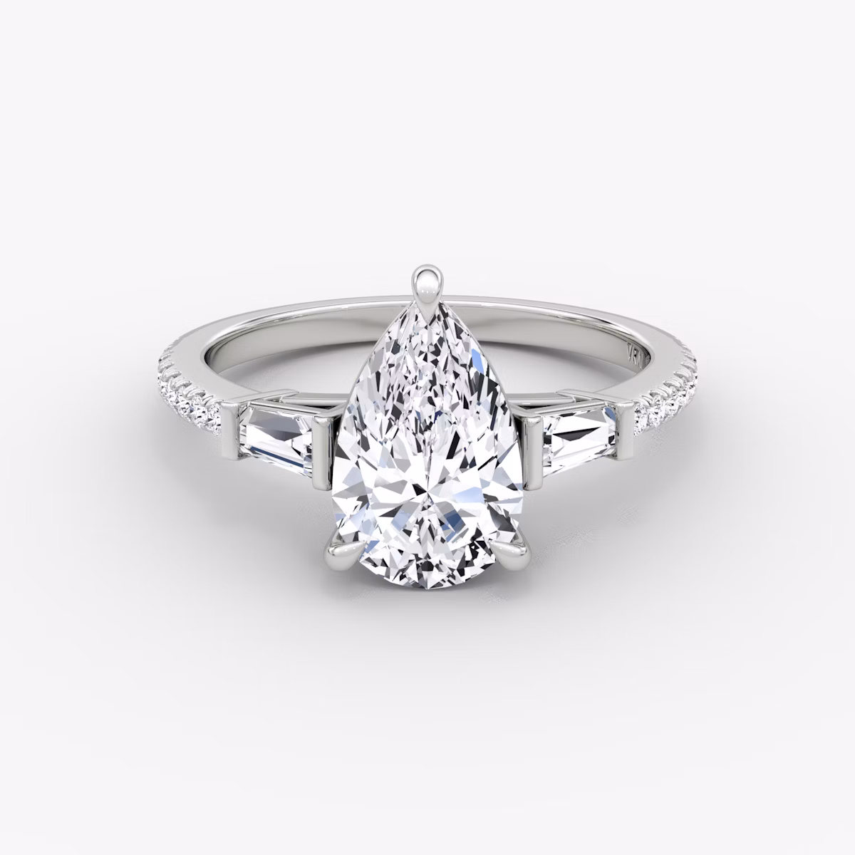 The Tapered Baguette Three Stone | Pear | Platinum | bandAccent: Pavé | caratWeight: 1.0ct | excludeFromFeed: null | diamondOrientation: vertical
