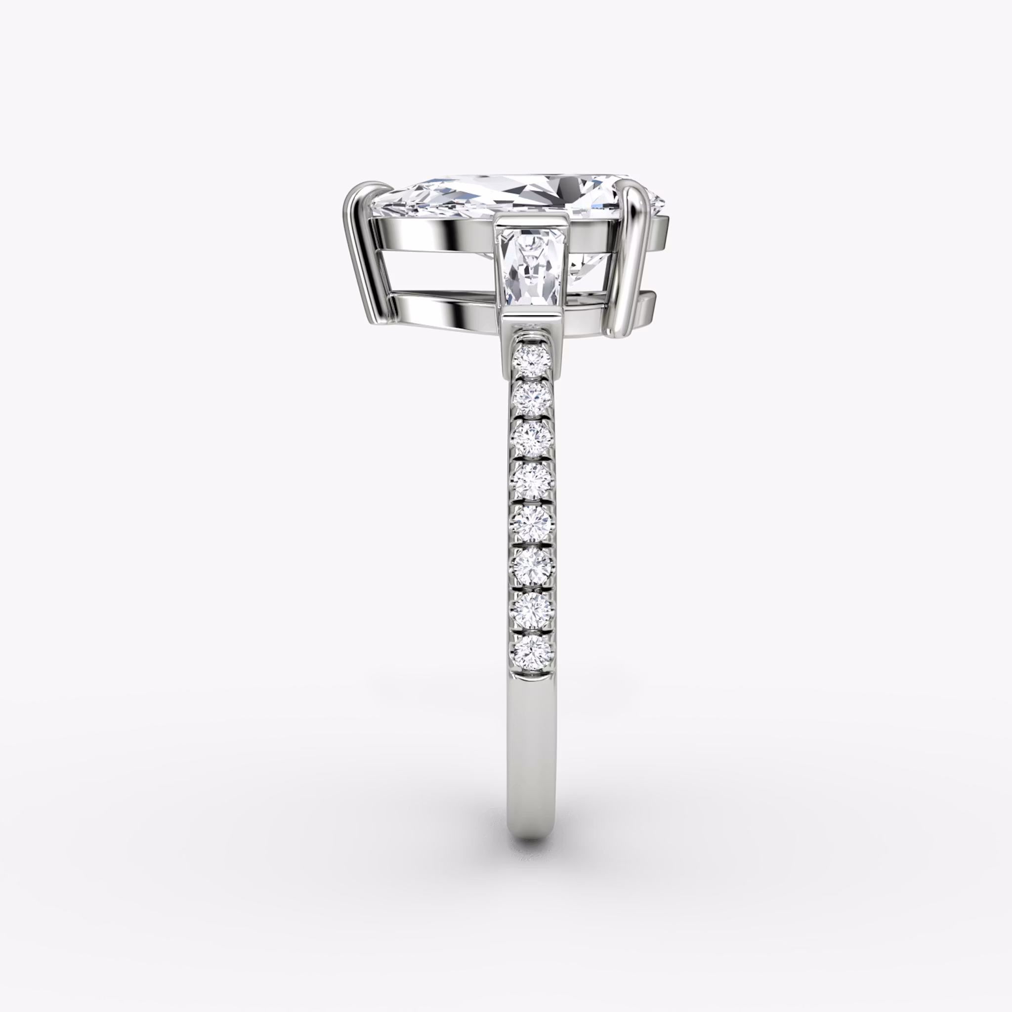 The Tapered Baguette Three Stone | Pear | 18k | White Gold | bandAccent: Pavé | excludeFromFeed: null | diamondOrientation: vertical | caratWeight: other