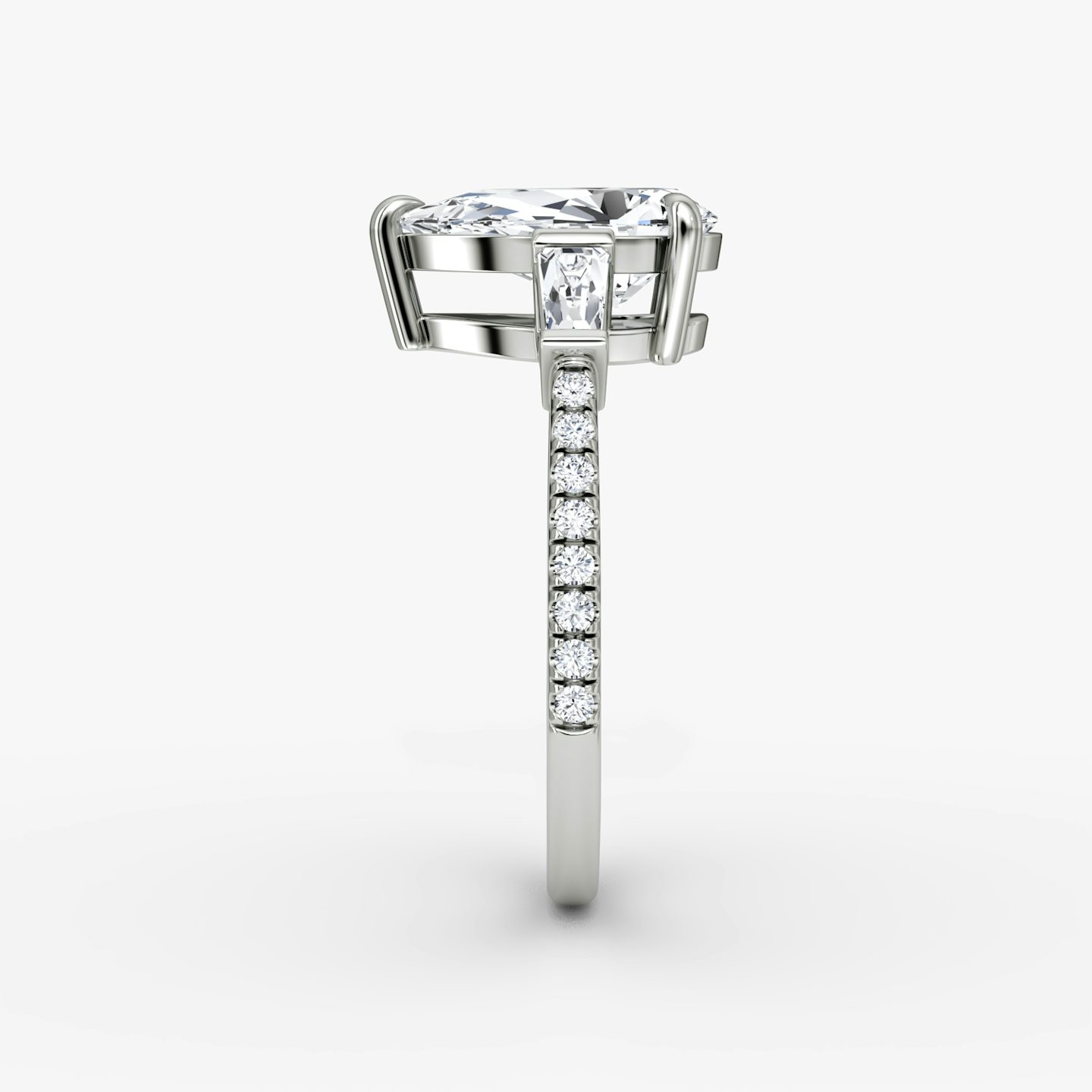 The Tapered Baguette Three Stone | Pear | 18k | White Gold | bandAccent: Pavé | excludeFromFeed: null | diamondOrientation: vertical | caratWeight: other
