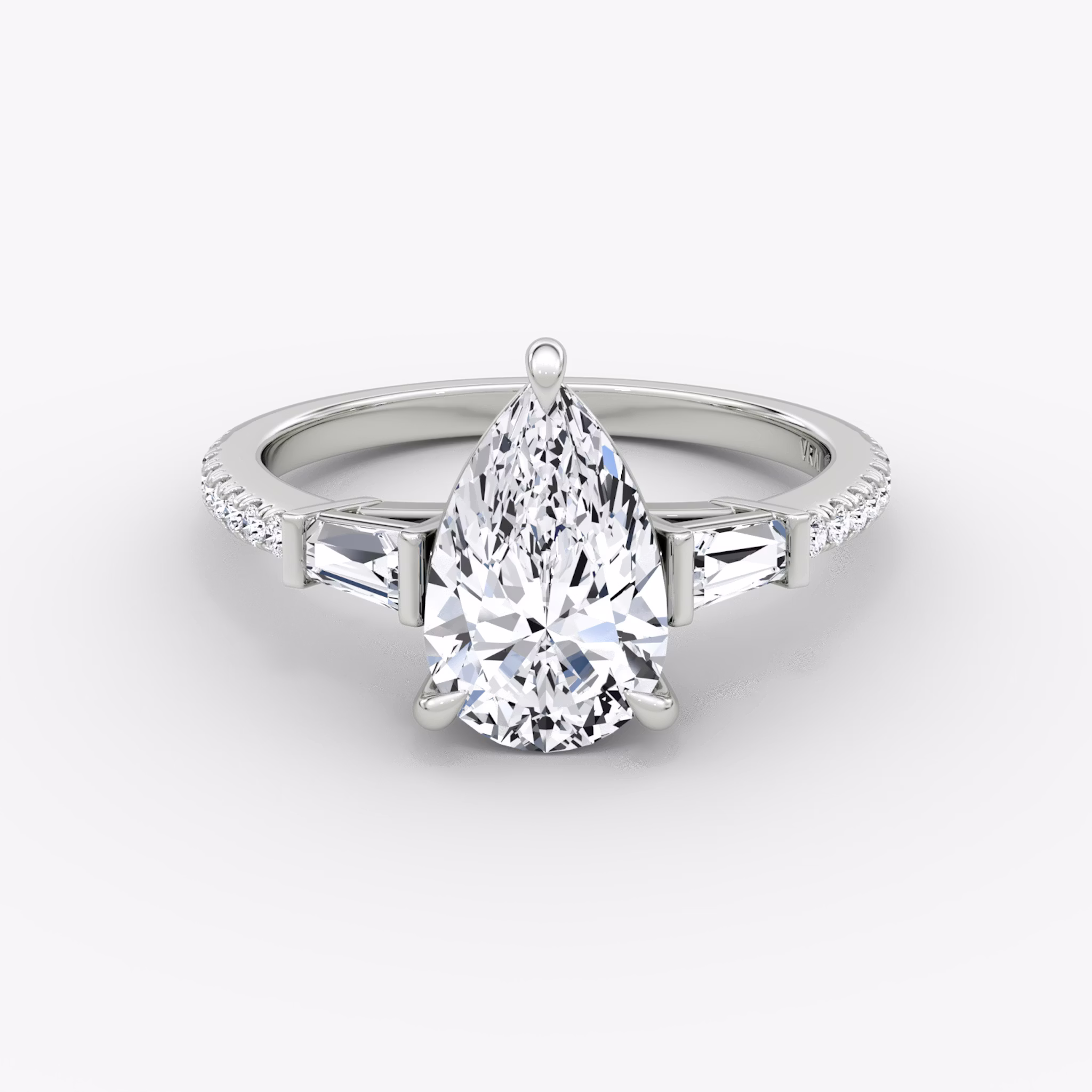 The Tapered Baguette Three Stone | Pear | 18k | White Gold | bandAccent: Pavé | excludeFromFeed: null | diamondOrientation: vertical | caratWeight: other