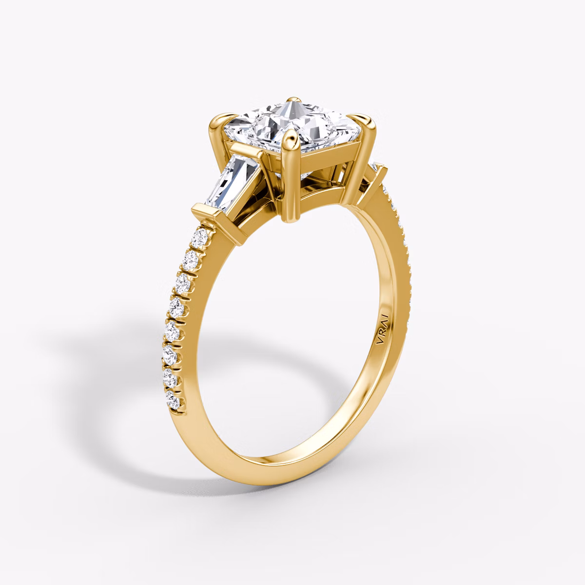 The Tapered Baguette Three Stone | Princess | 18k | Yellow Gold | bandAccent: Pavé | caratWeight: 1.0ct | excludeFromFeed: null | diamondOrientation: vertical