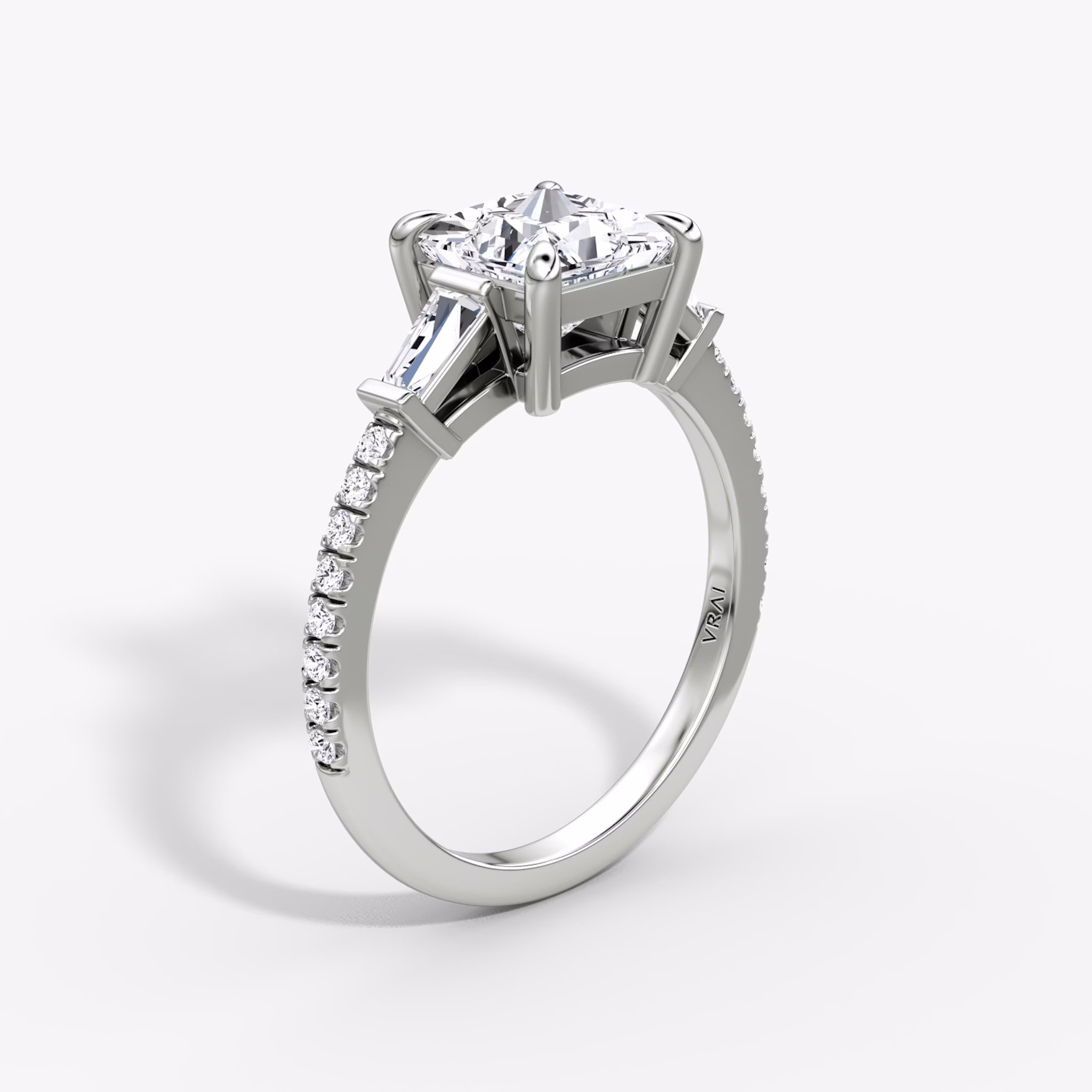 The Tapered Baguette Three Stone | Princess | 18k | White Gold | bandAccent: Pavé | excludeFromFeed: null | diamondOrientation: vertical | caratWeight: other