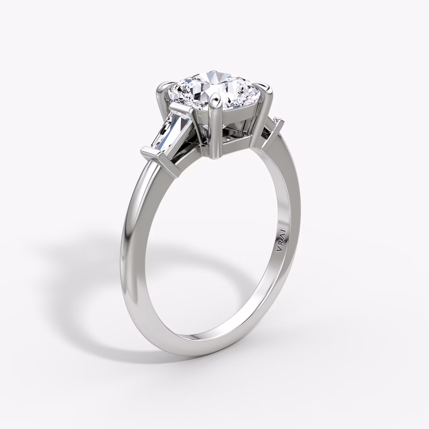 The Tapered Baguette Three Stone | Cushion | 18k | White Gold | bandAccent: Plain | excludeFromFeed: null | diamondOrientation: vertical | caratWeight: other