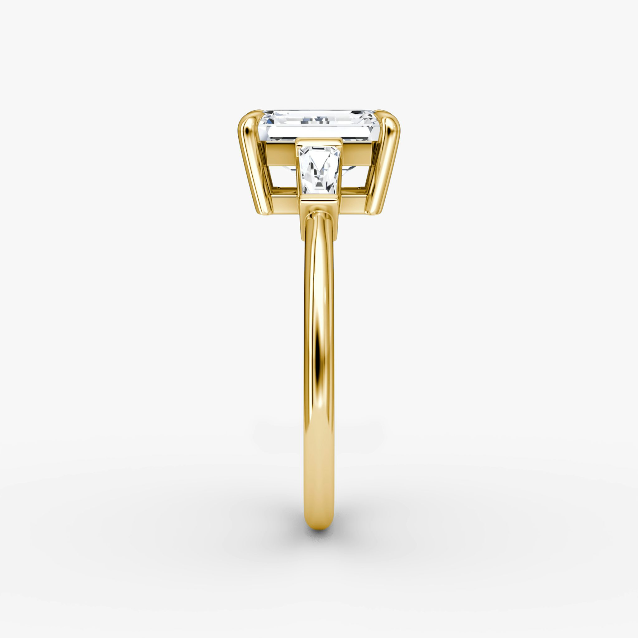 The Tapered Baguette Three Stone | Emerald | 18k | Yellow Gold | bandAccent: Plain | excludeFromFeed: null | diamondOrientation: vertical | caratWeight: other