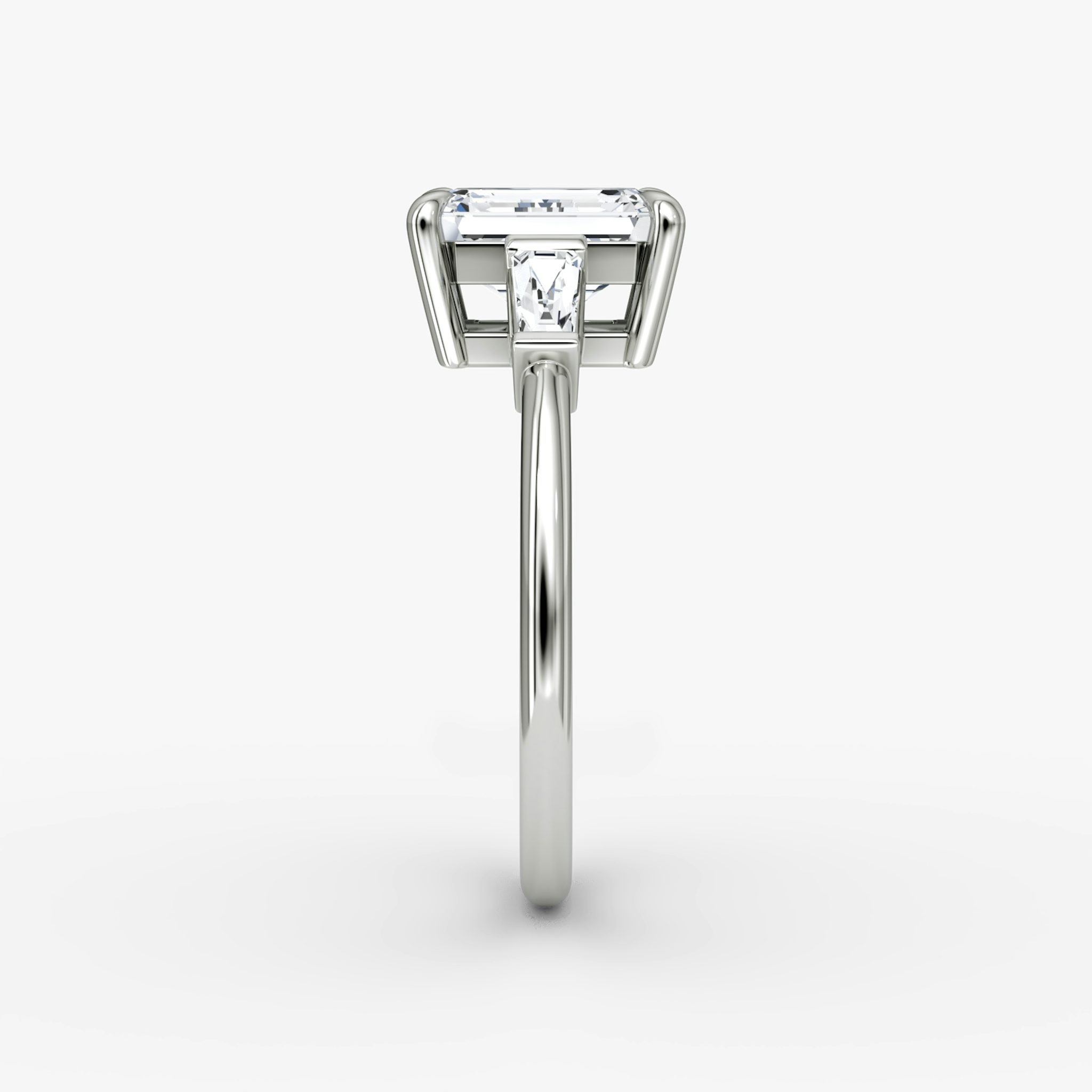 The Tapered Baguette Three Stone | Emerald | 18k | White Gold | bandAccent: Plain | excludeFromFeed: null | diamondOrientation: vertical | caratWeight: other