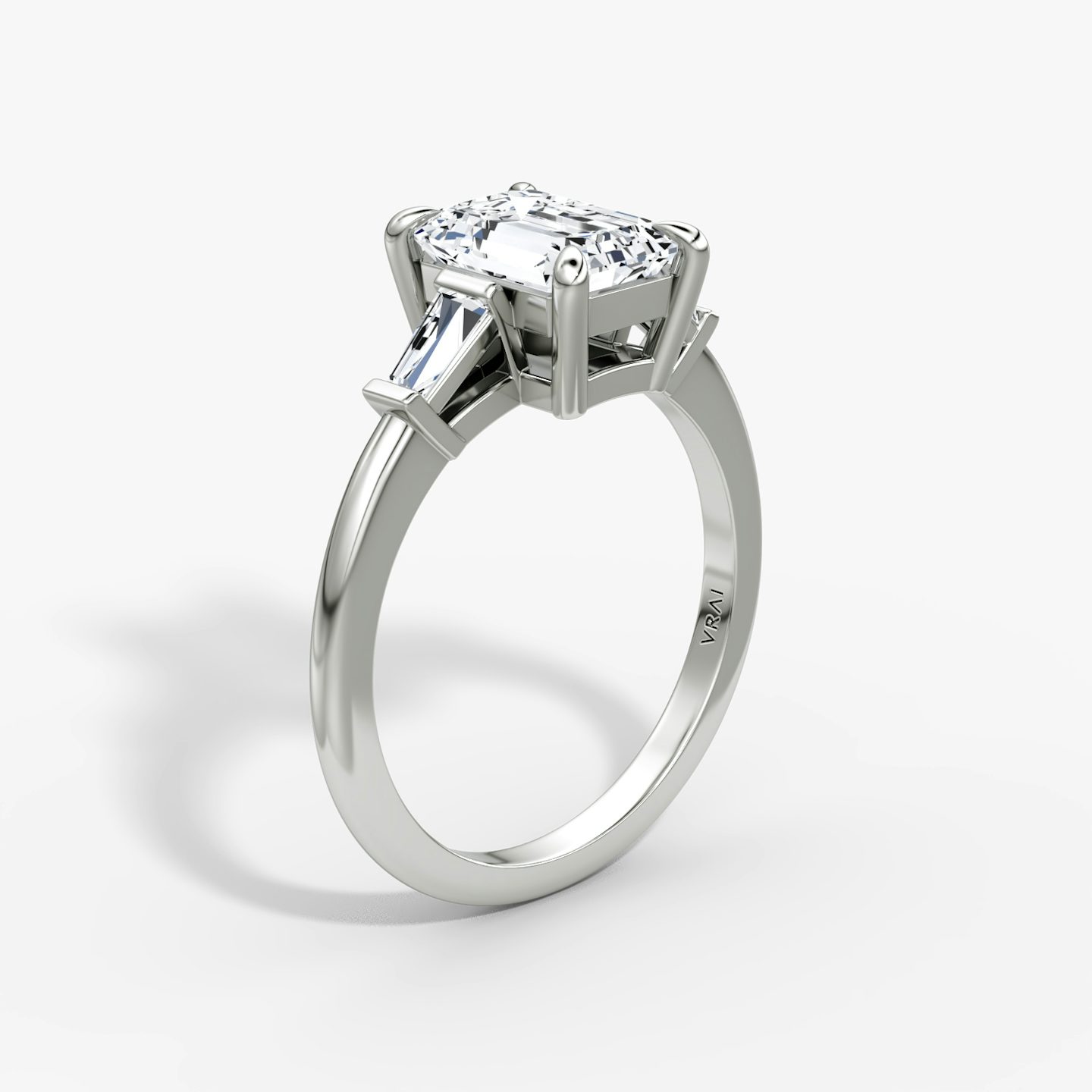 The Tapered Baguette Three Stone | Emerald | 18k | White Gold | bandAccent: Plain | excludeFromFeed: null | diamondOrientation: vertical | caratWeight: other